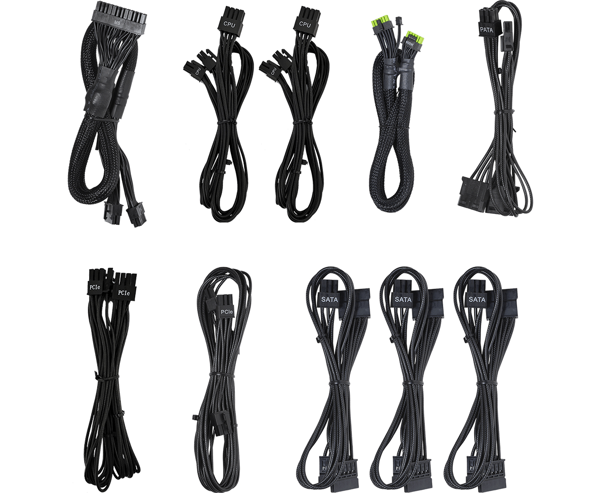 Zestaw czarnych kabli zasilających do komputera. Widoczne są różne typy i złącza.