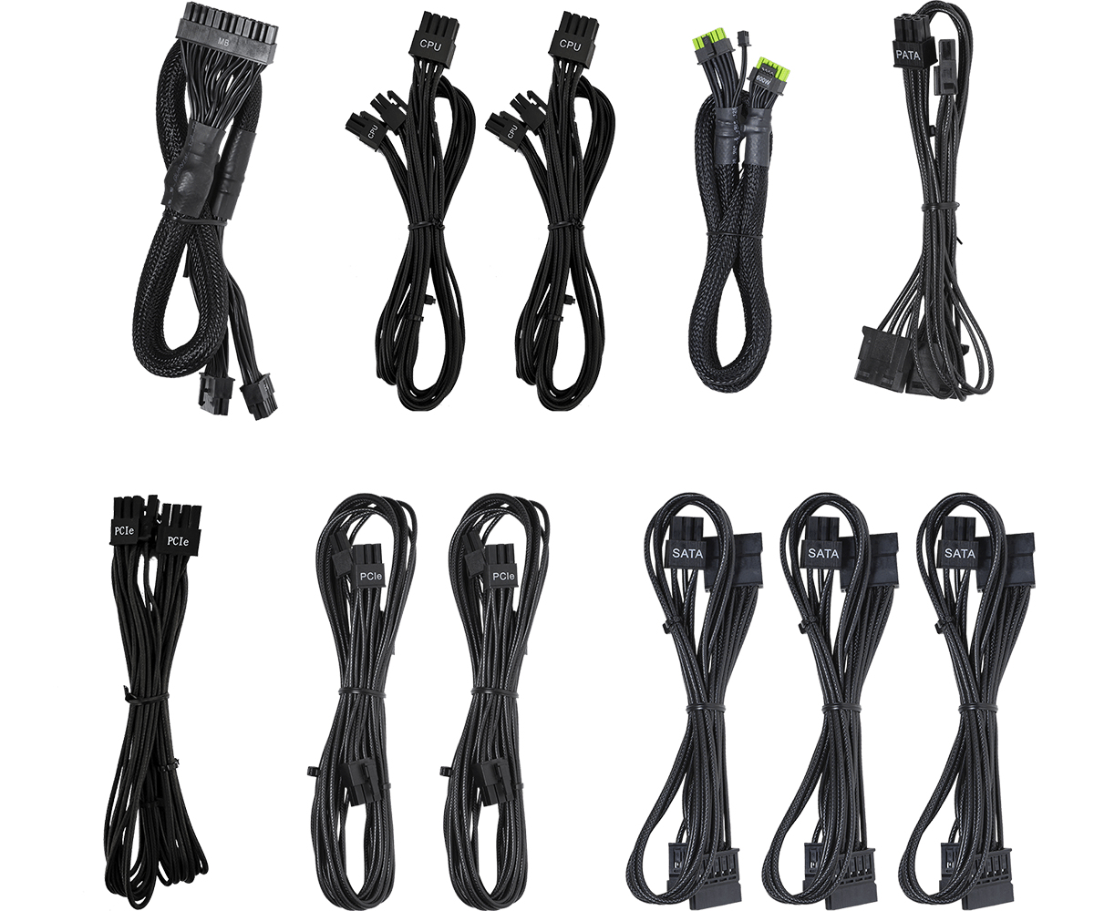 Różne czarne kable zasilające do komputera, niektóre w wiązkach, na białym tle.