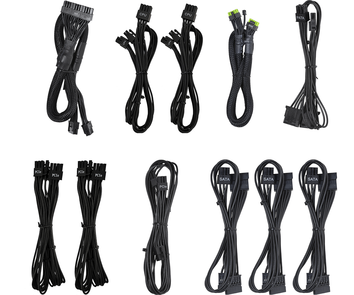 Różne czarne kable zasilające do komputera ze złączami. Ułożone na białym tle.