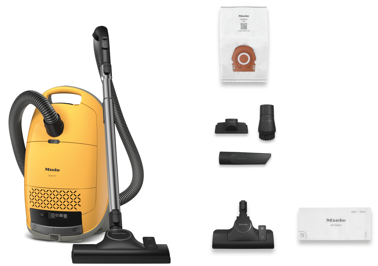 Żółty odkurzacz i akcesoria na białym tle.