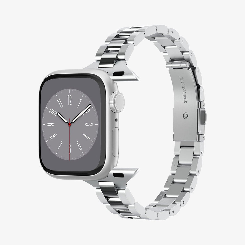 Apple Watch argento con cinturino in metallo. Lo schermo mostra l'ora.