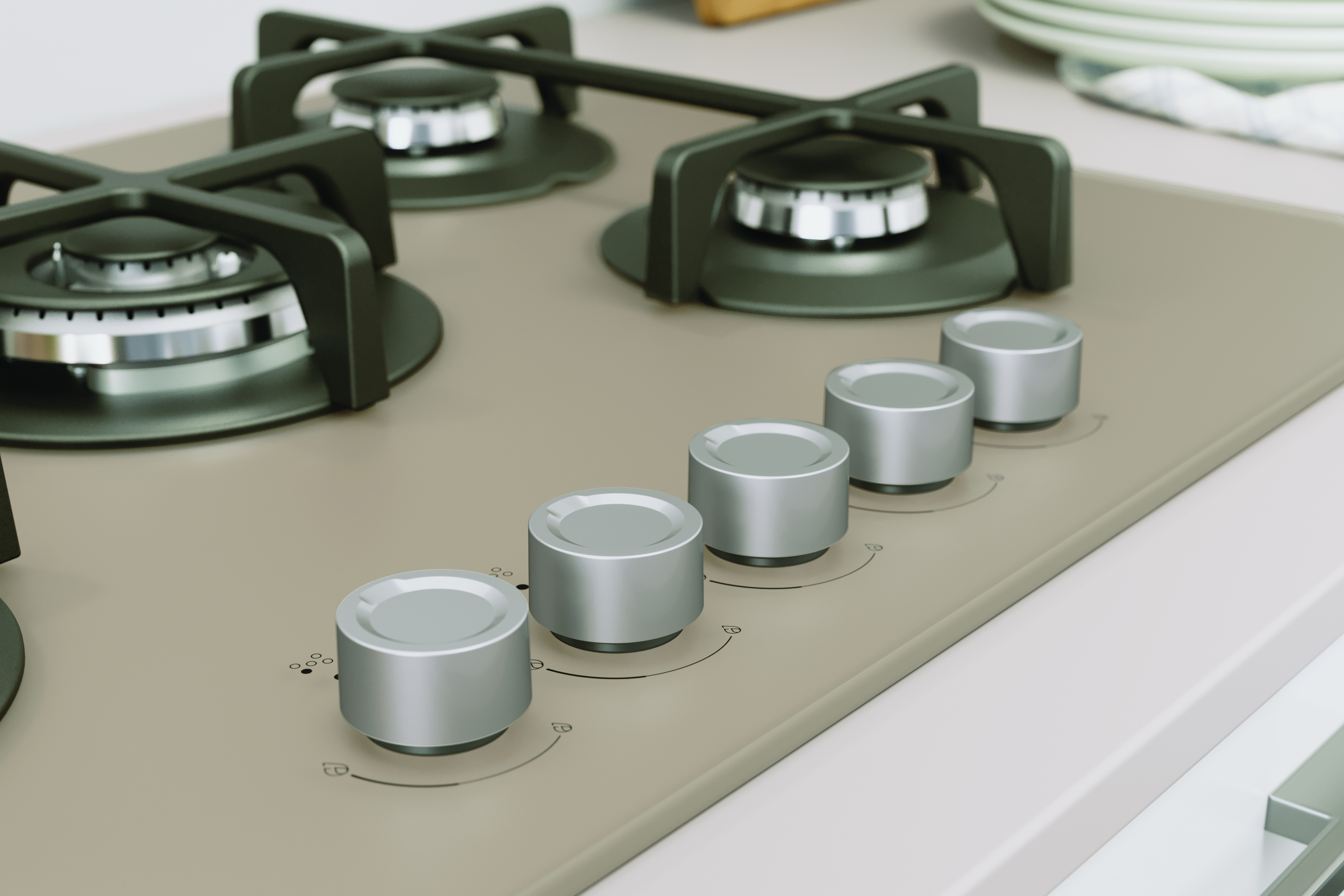 Cocina de gas con 4 quemadores y perillas plateadas. Superficie gris claro y un fondo blanco. Primer plano.