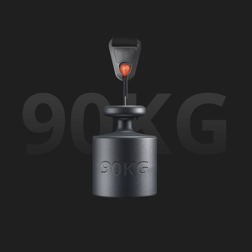 Czarny odważnik z paskiem do zawieszania. Tekst na odważniku mówi '90KG'.