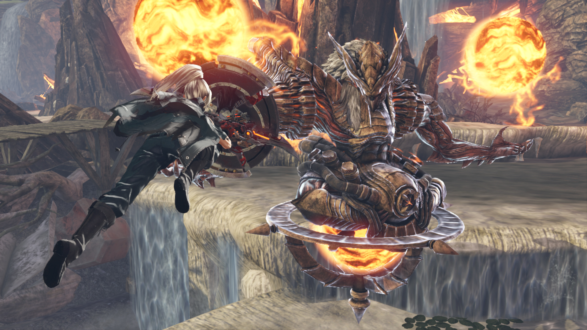 Postać walczy z dużym potworem w skalistym, naturalnym otoczeniu.