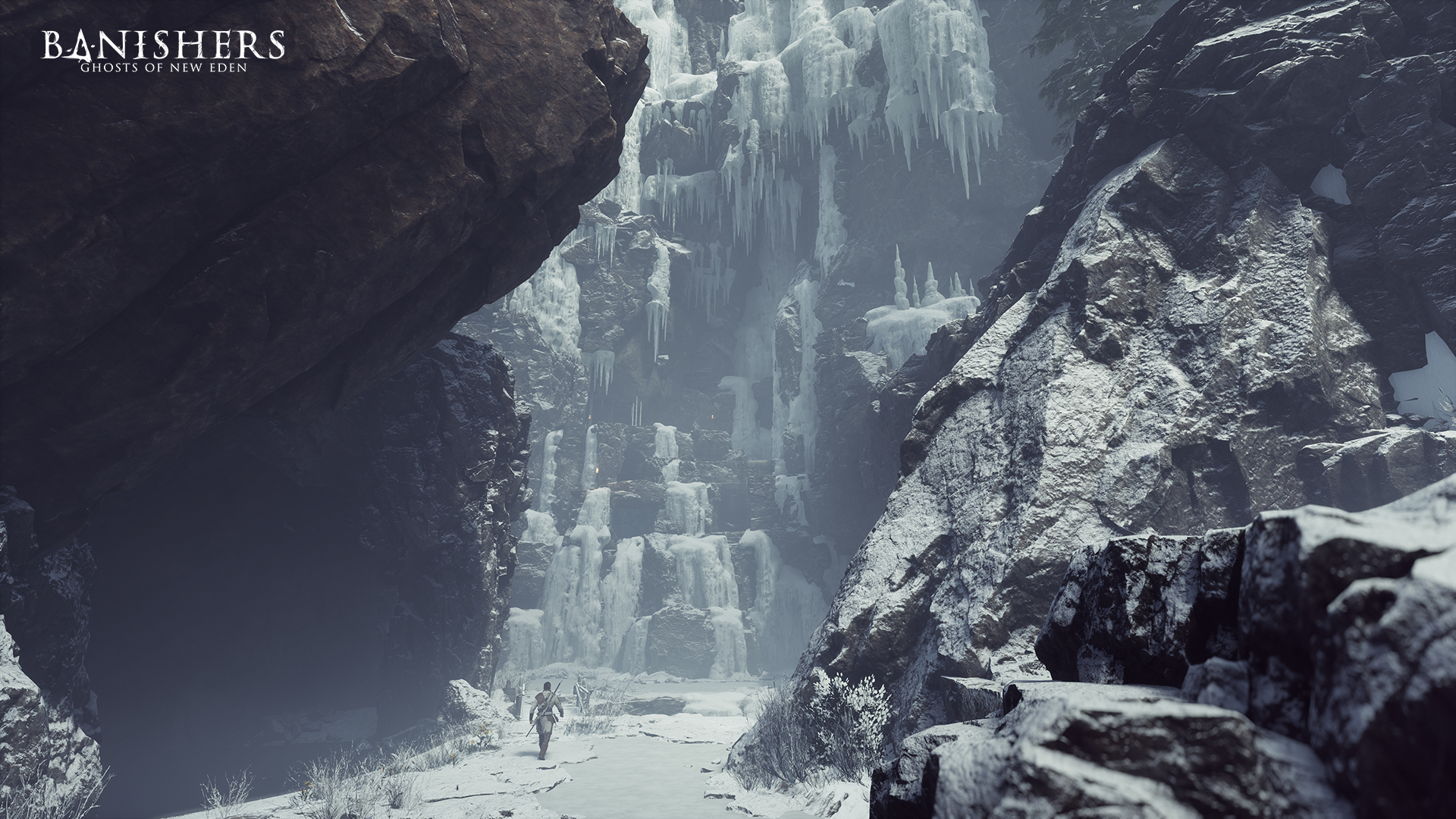 Un paisaje invernal con hielo y nieve. Una figura camina hacia una cascada y el título del juego es visible.