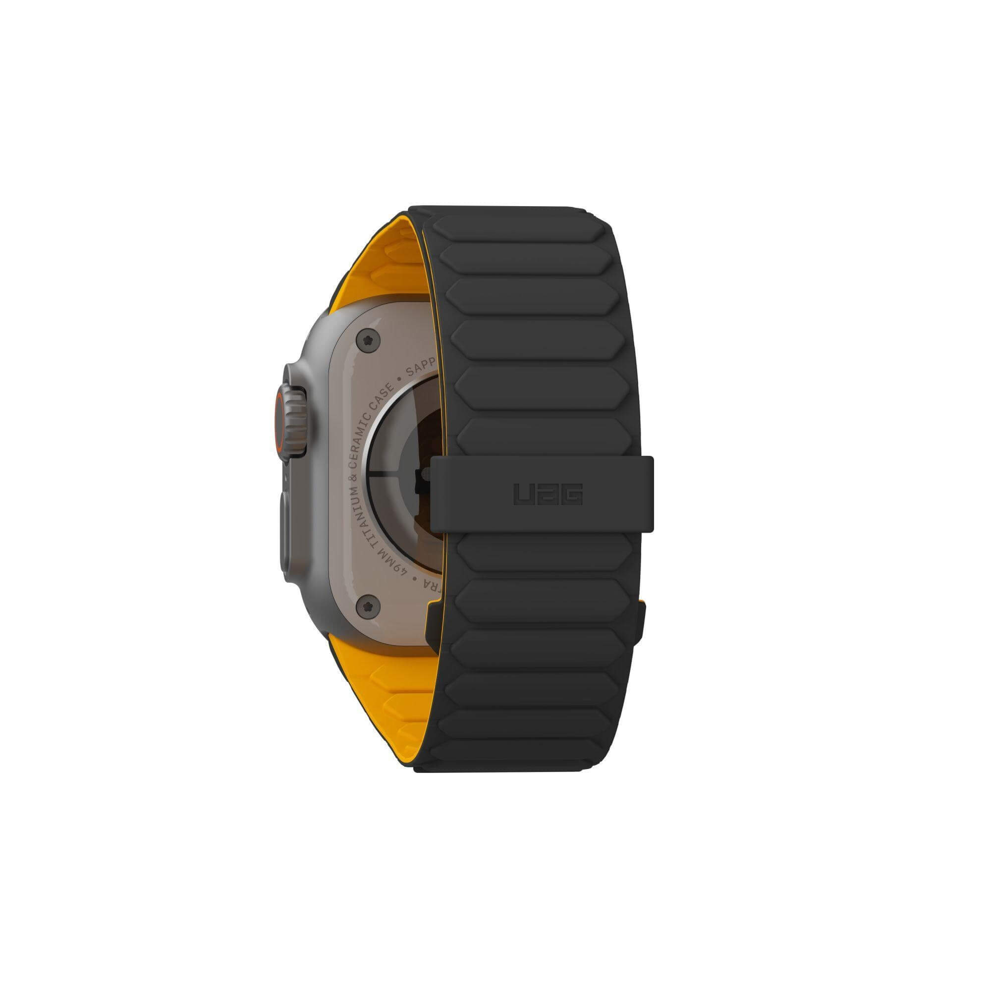 Czarny smartwatch z żółtym paskiem, widoczny tył, białe tło.