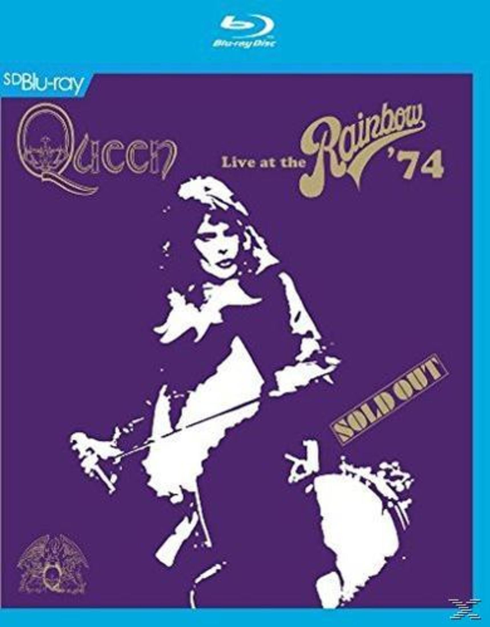 Okładka albumu Queen. Sylwetka na fioletowym tle. Tekst: Queen Live at the Rainbow '74. Wyprzedane.