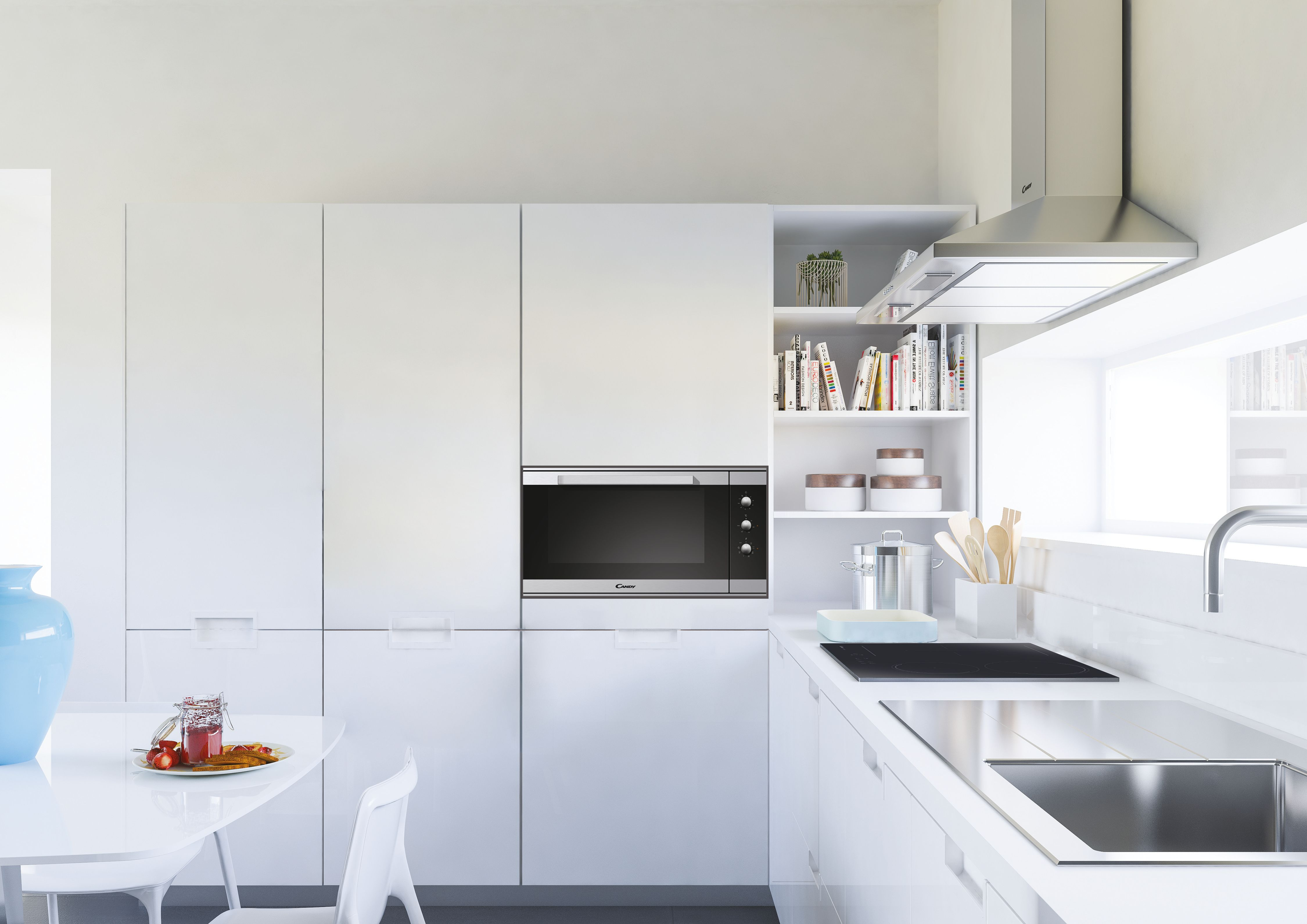 Una moderna cucina bianca con microonde nero. Include tavolo, sedia e un armadio parzialmente aperto.