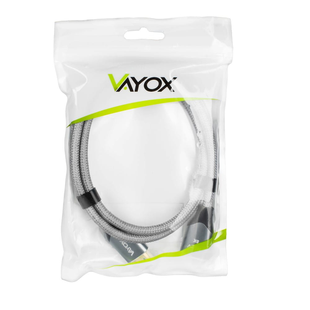 Przezroczysty plastikowy opakowanie z szarym i czarnym kablem. Widoczne logo Vayox.