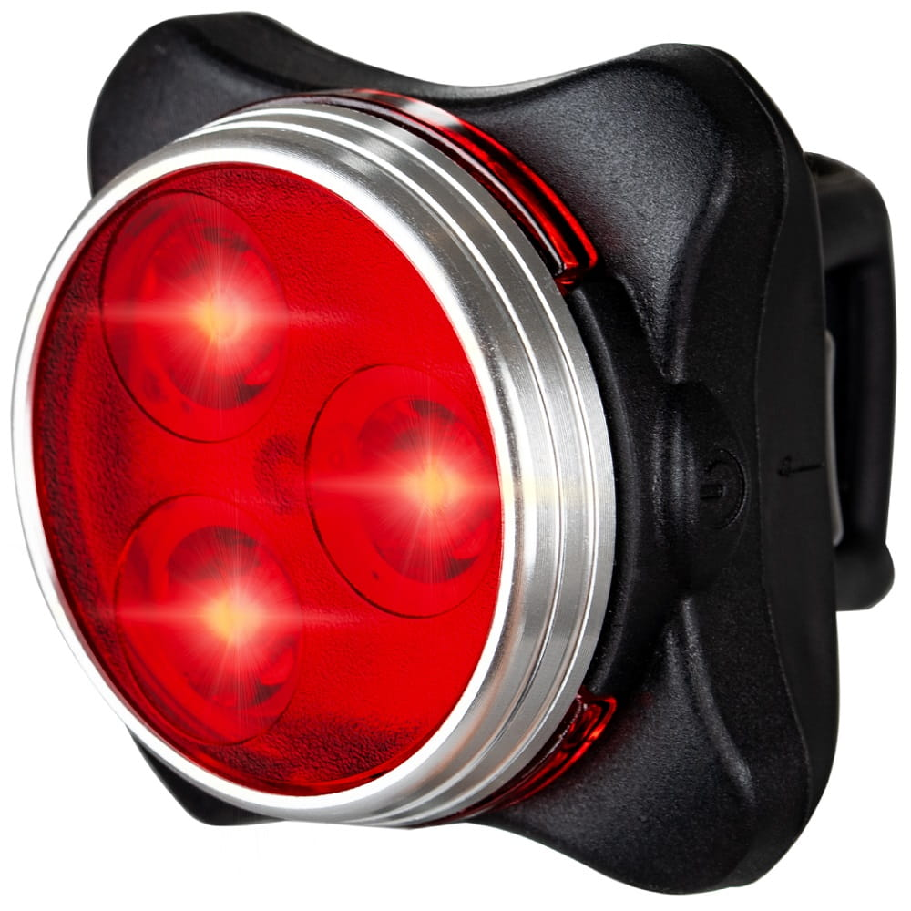 Światło tylne roweru. Trzy jasne czerwone światła. Czarna obudowa ze srebrnym wykończeniem.