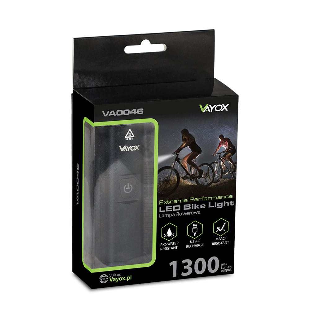 Czarne i zielone pudełko z grafiką i tekstem światła rowerowego na białym tle.