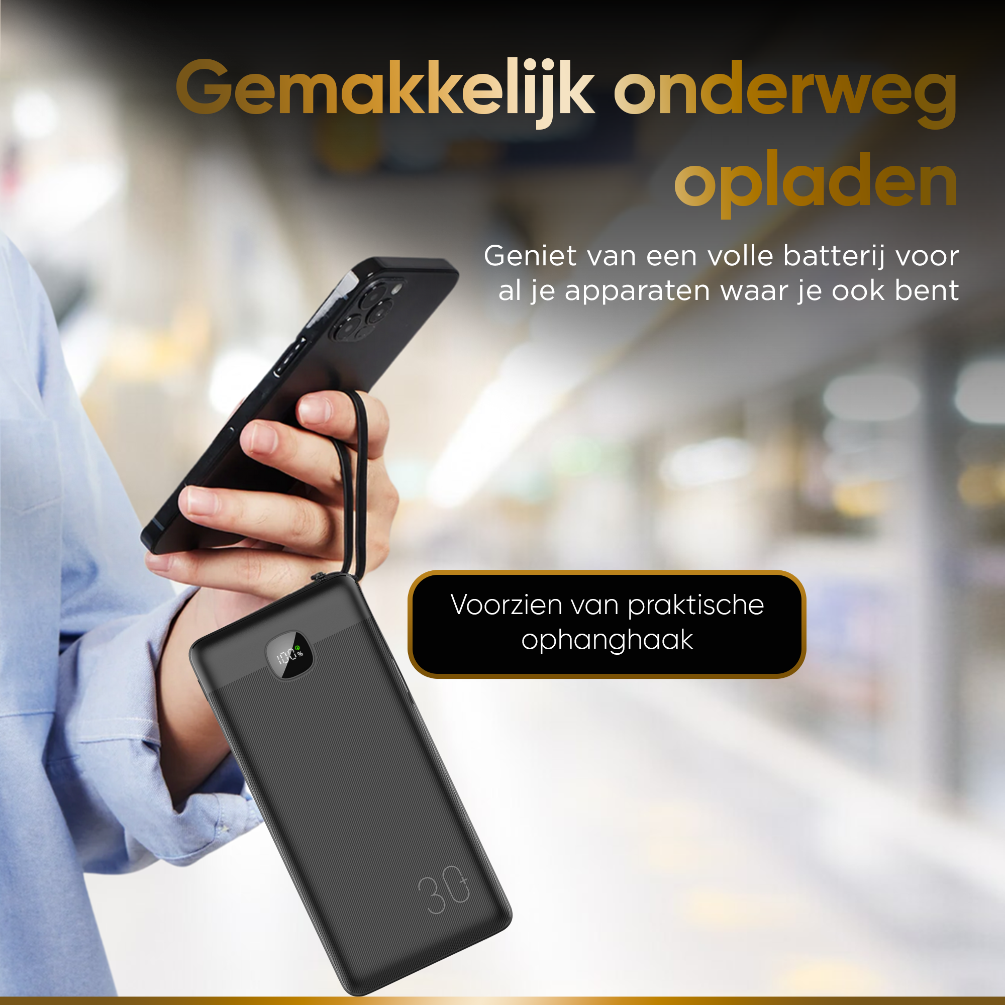 A black power bank with a phone attached. The power bank has a screen displaying the battery.