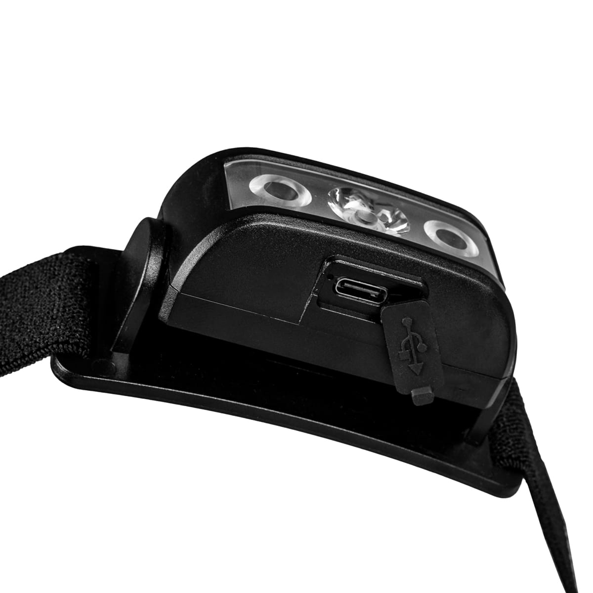 Zbliżenie czarnej lampy czołowej z otwartą osłoną portu USB, odsłaniającą port ładowania.