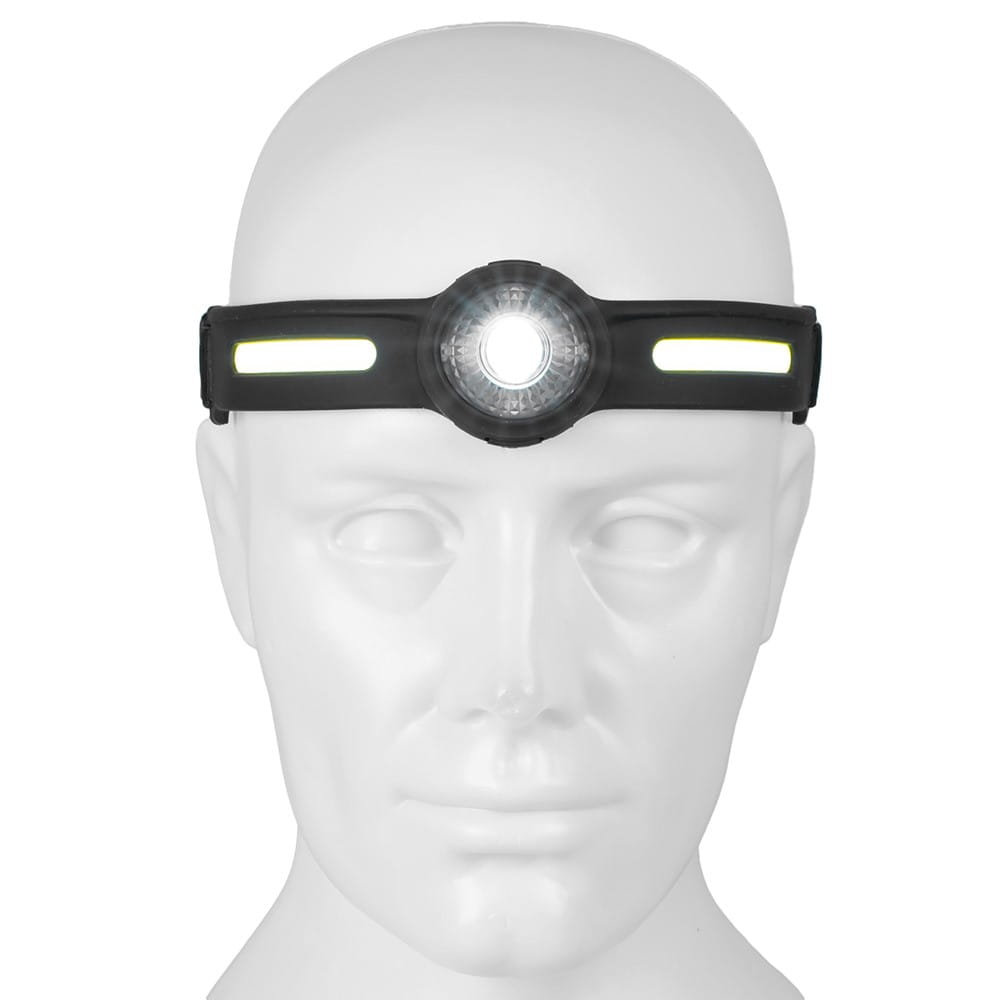 Głowa manekina z czarną lampą czołową. Lampa ma białe światło i żółte akcenty.