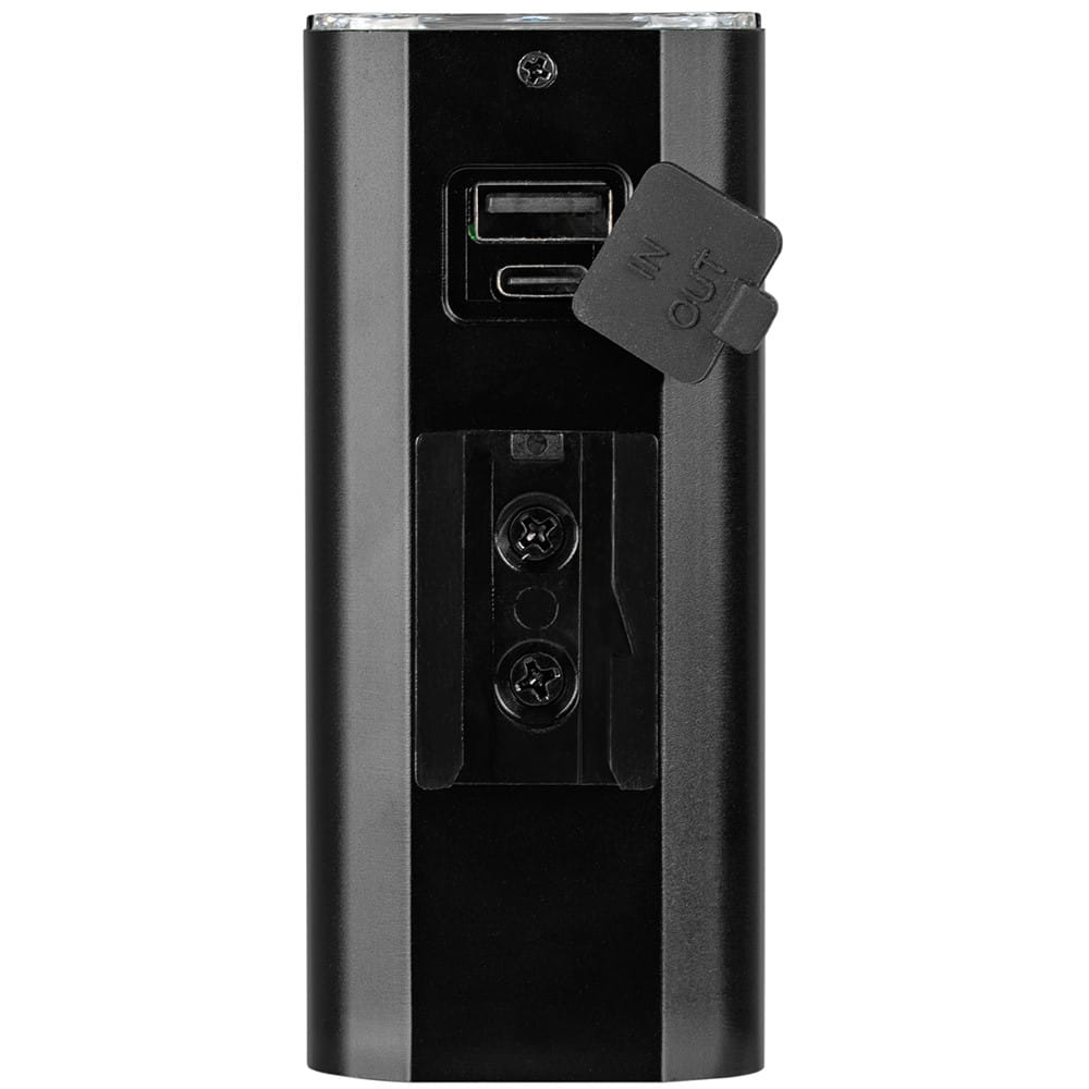 Pokazano czarną lampkę rowerową z portem ładowania. Ma dwa porty USB i klapkę.