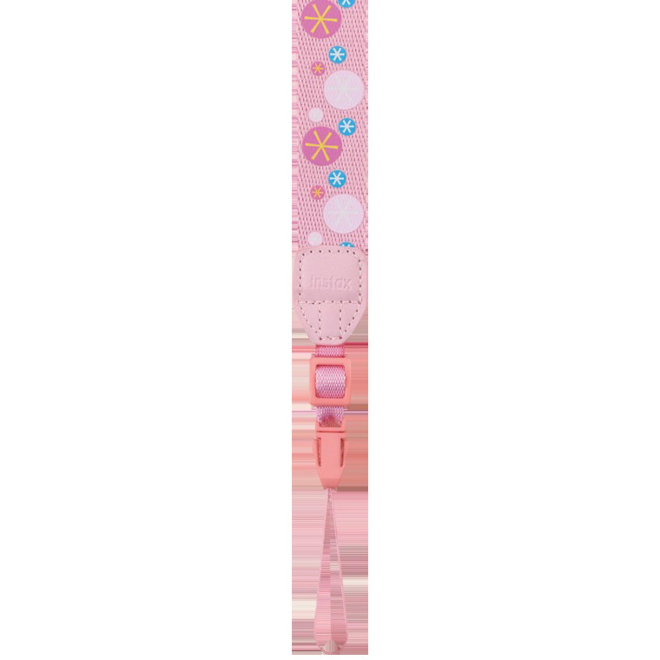 Cinturino rosa per fotocamera con motivi floreali e marchio Instax, assicurato con fibbia rosa.