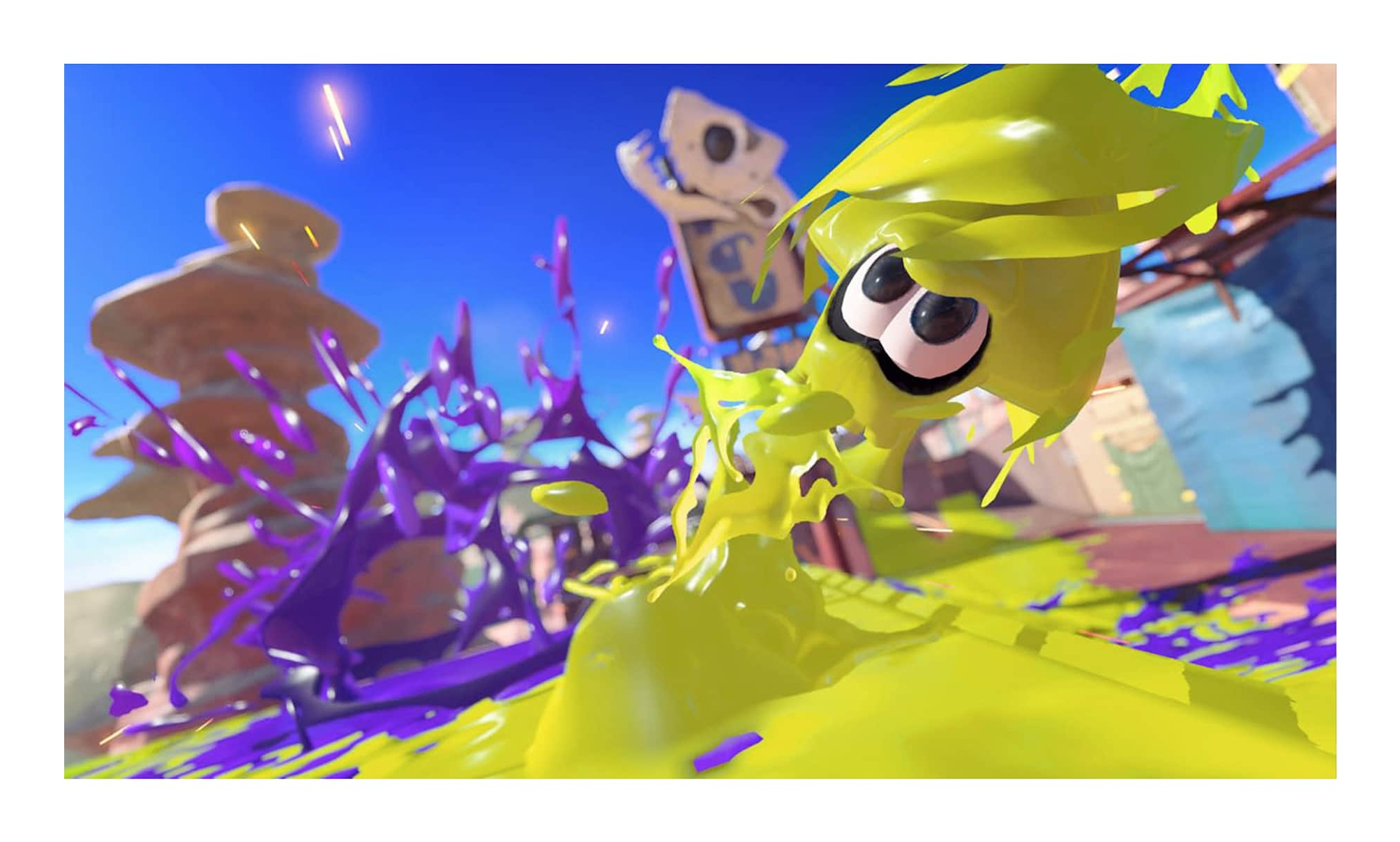 Zbliżenie żółtego inklinga z dużym okiem, poplamionego fioletowym tuszem.