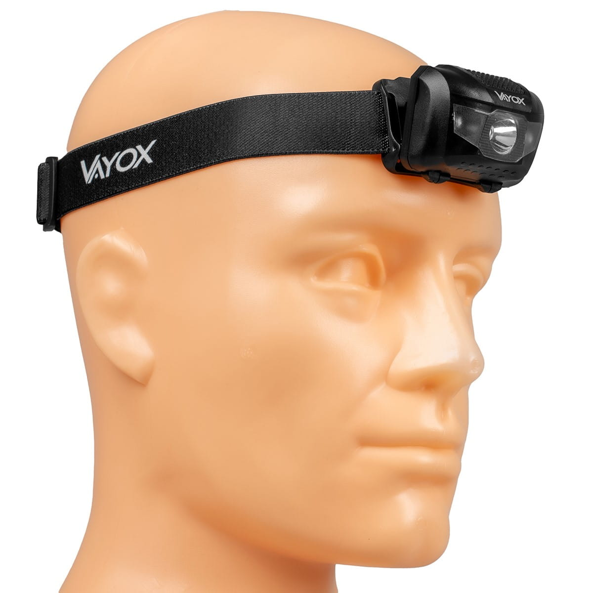 Latarka czołowa na głowie manekina. Czarny pasek, czarna latarka czołowa z 'VAYOX'.