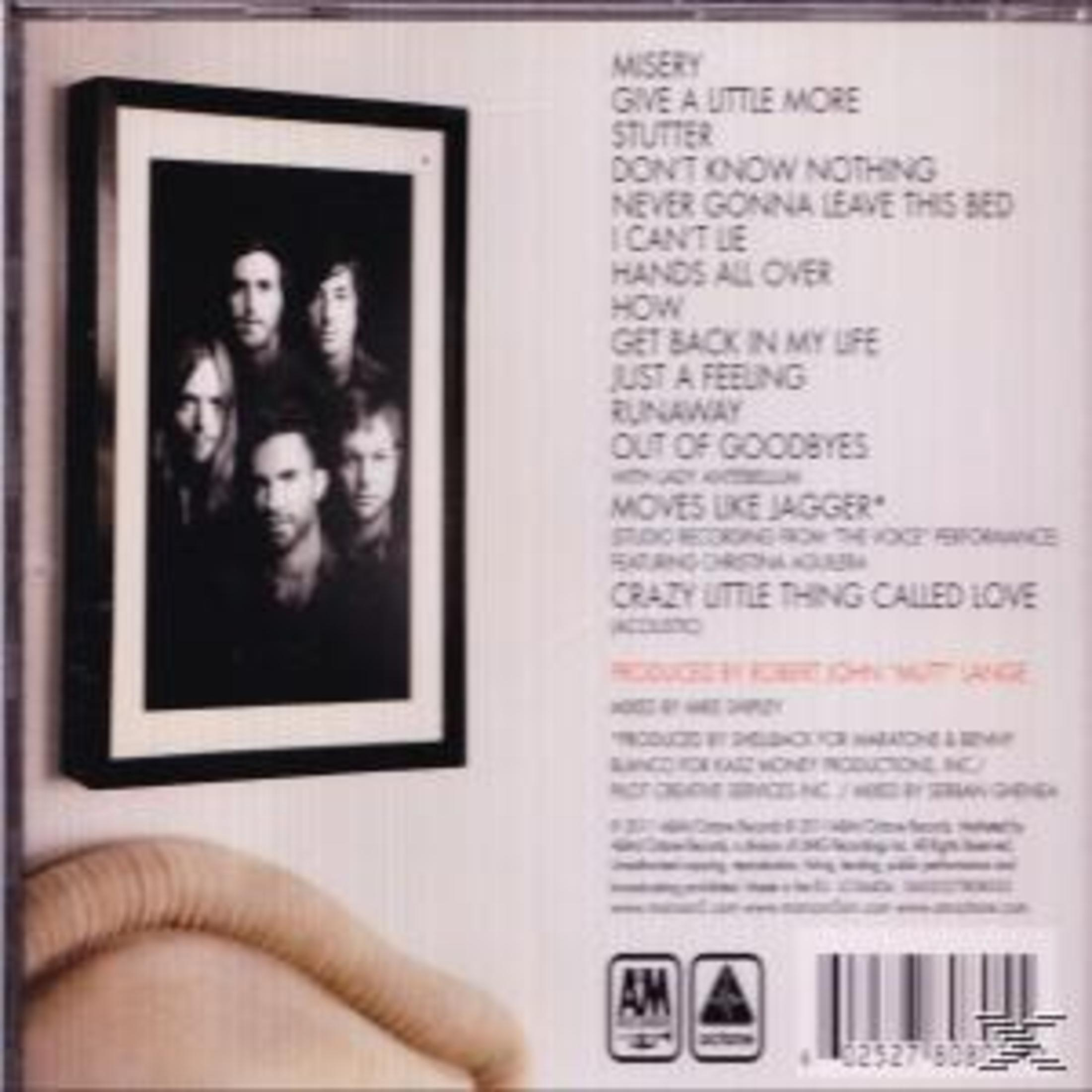 Tylna okładka albumu ze zdjęciem w ramce i listą utworów na białym tle.