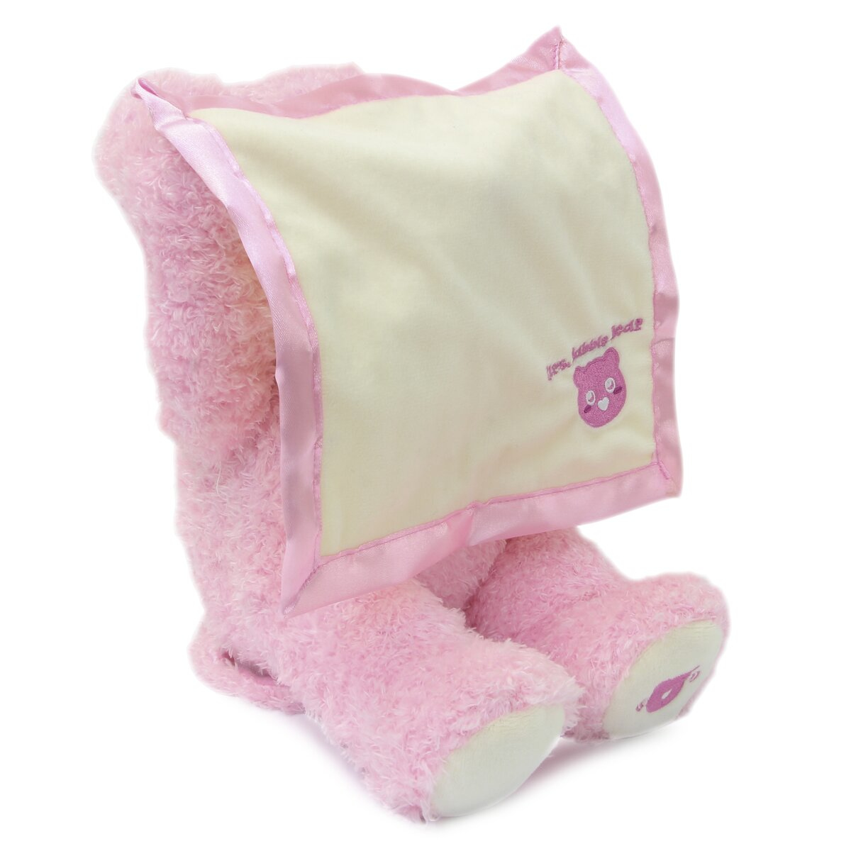 Rosa Teddybär mit cremefarbener Decke. Die Decke hat eine rosa Bordüre und Bärenstickerei. Der Bär ist kopfüber.