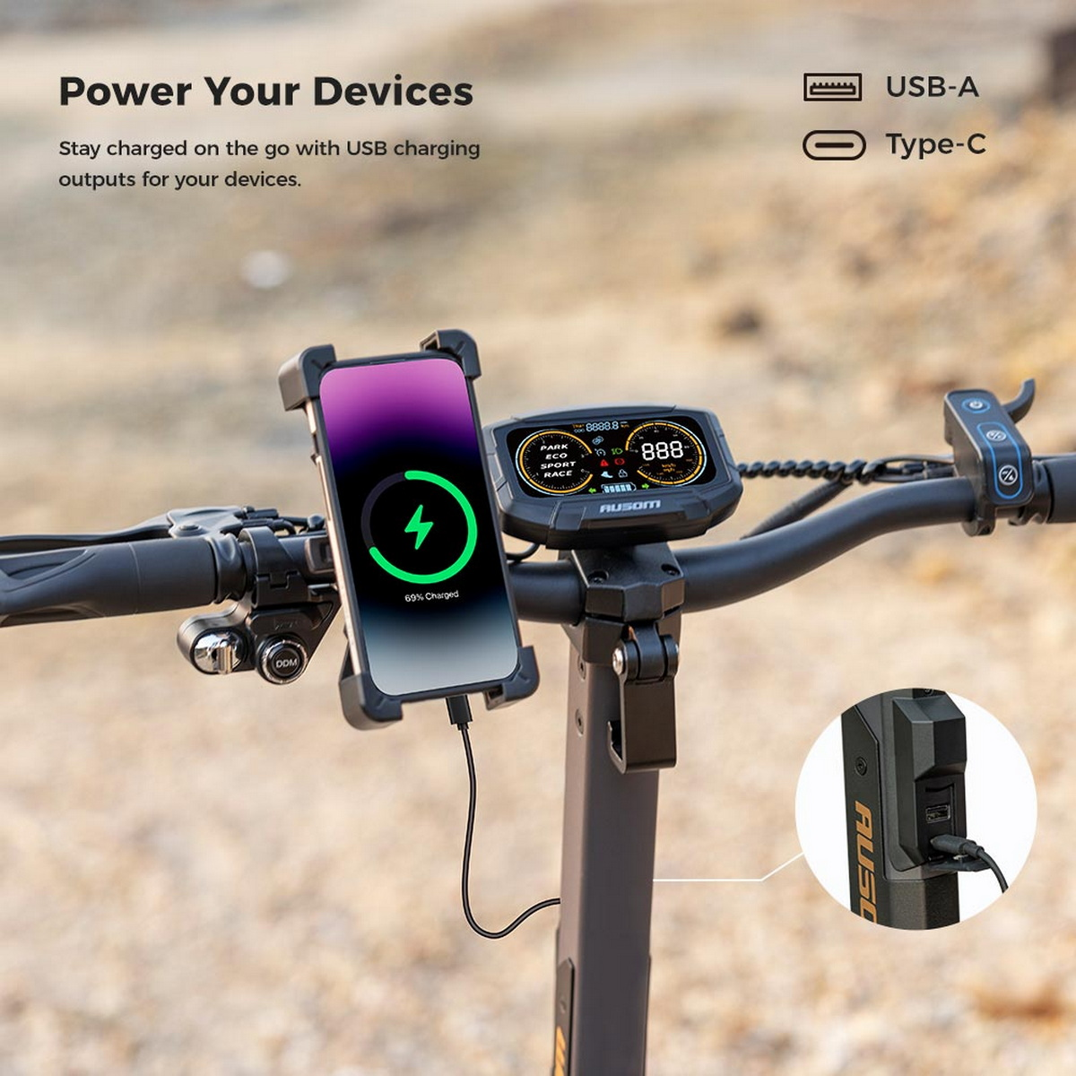Hulajnoga elektryczna z telefonem zamontowanym na kierownicy w trakcie ładowania. Widoczne opcje ładowania USB i Type-C.