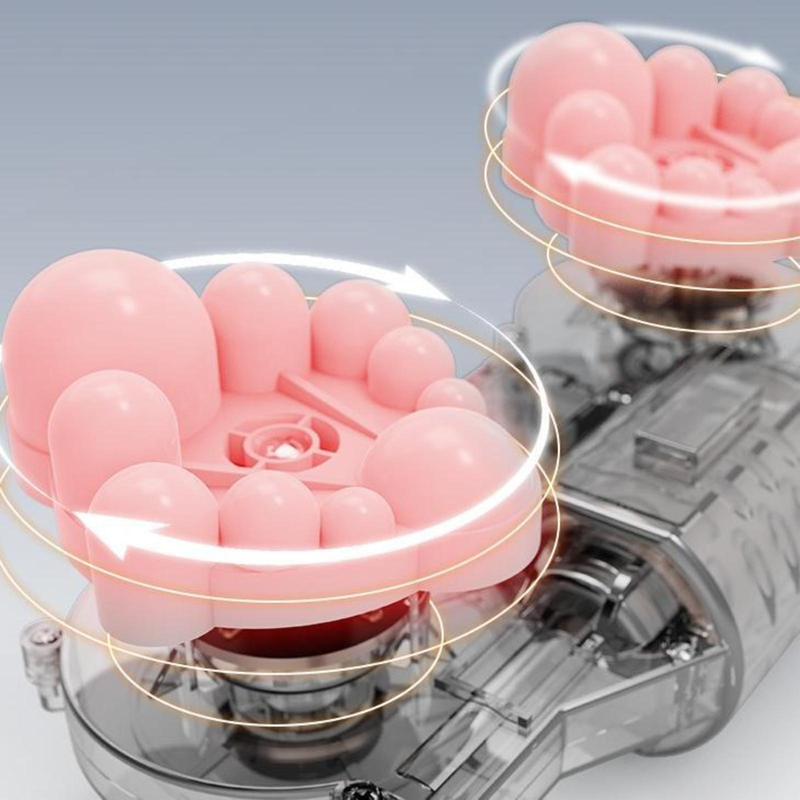 Nahaufnahme eines pinkfarbenen Fußmassagegeräts mit rotierenden Teilen. Die Komponenten sind pink und transparent.