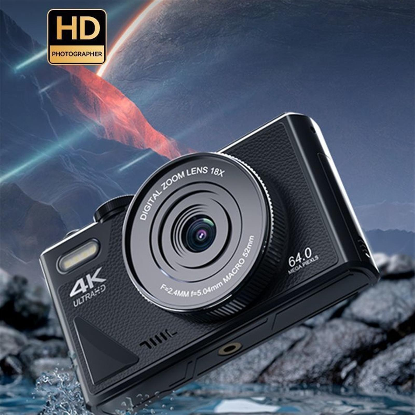 Eine schwarze Digitalkamera, abgewinkelt, mit Zoomobjektiv und mit 64,0 Megapixeln beschriftet. Der Hintergrund ist unscharf.