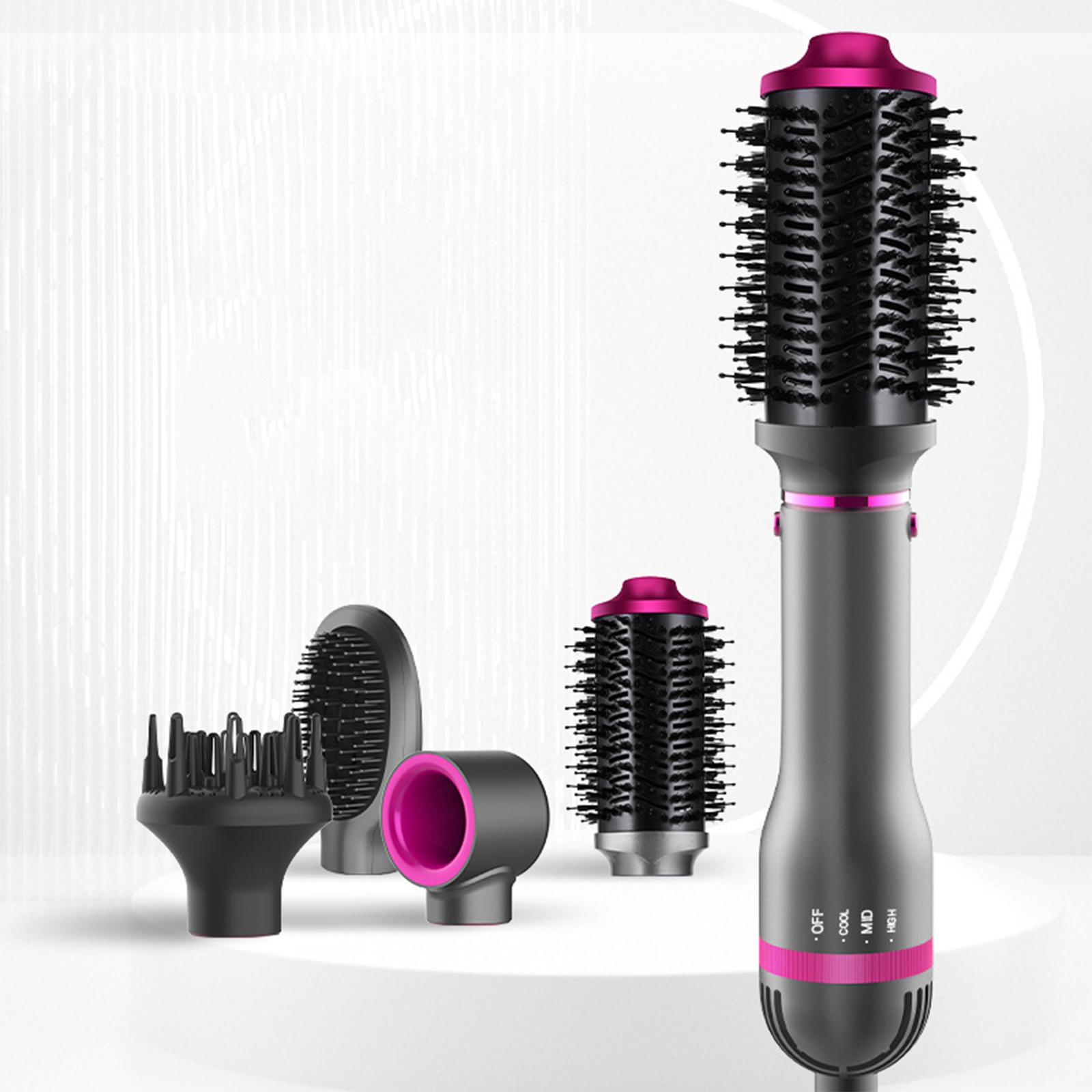 Haarstyling-Werkzeugset. Schwarz und rosa. Enthält einen Haartrockner und verschiedene Aufsätze.