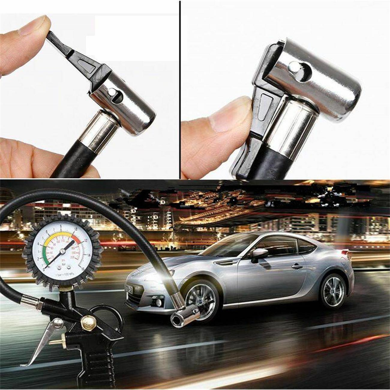 Luftkompressor-Manometer und Düse mit Auto im Hintergrund. Schwarze und metallische Elemente.
