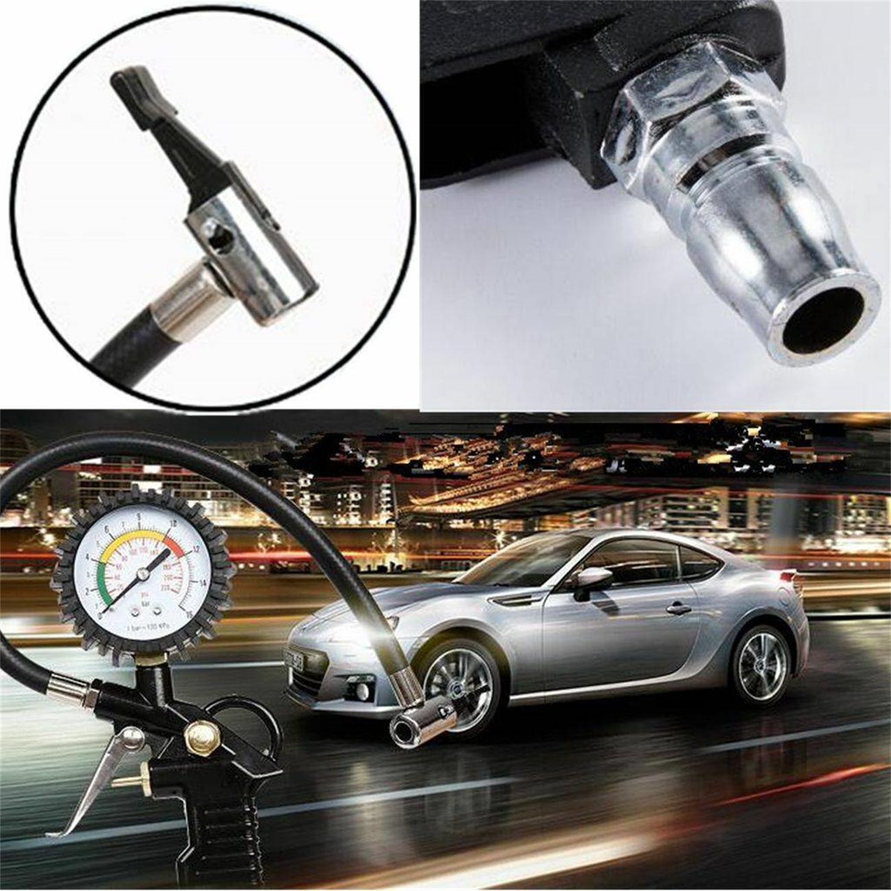 Ein Luftkompressor mit Manometer, Düse und einem Autoreifen. Das Auto ist silberfarben.