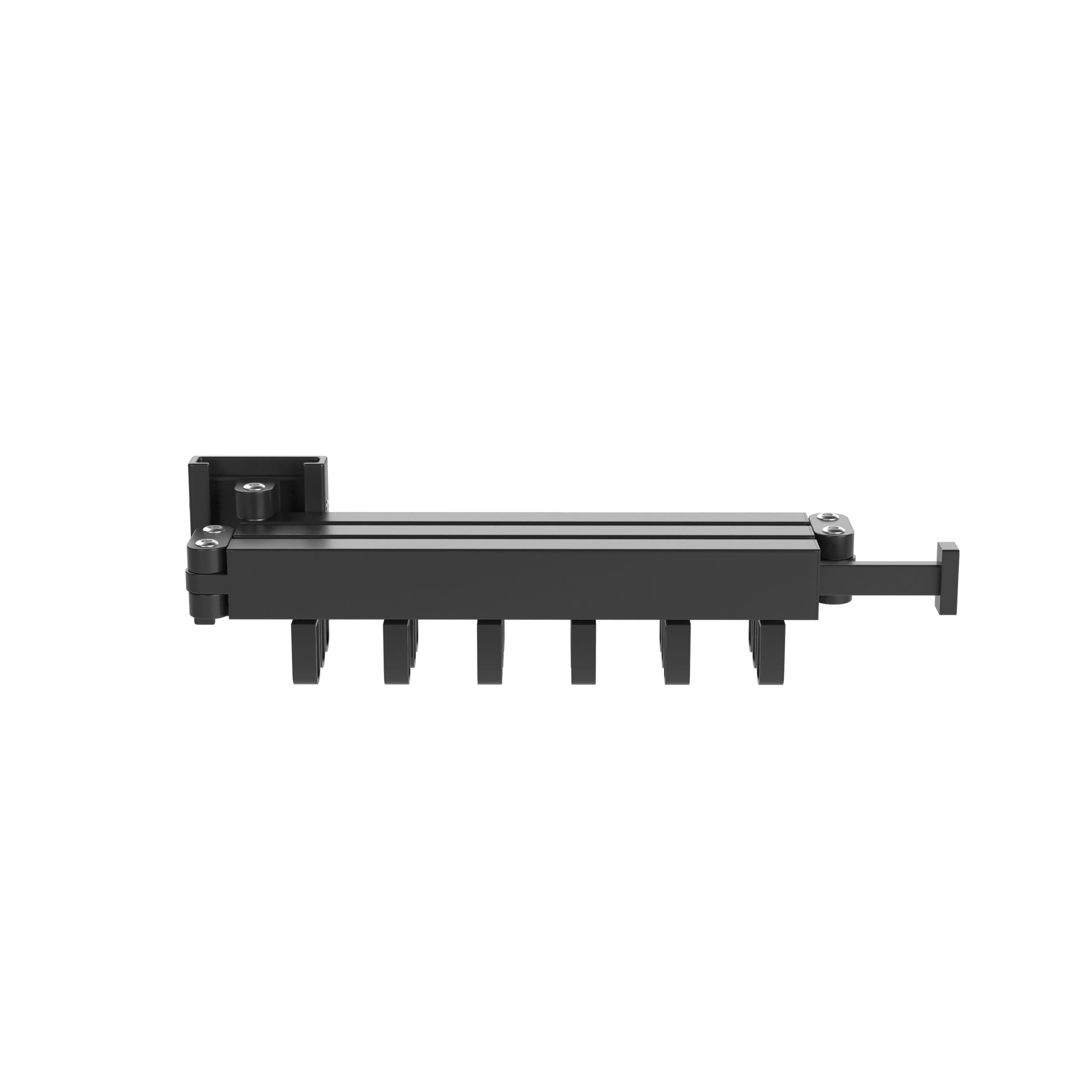 Black, metal-like object with prongs. It is a part of a larger machine.
