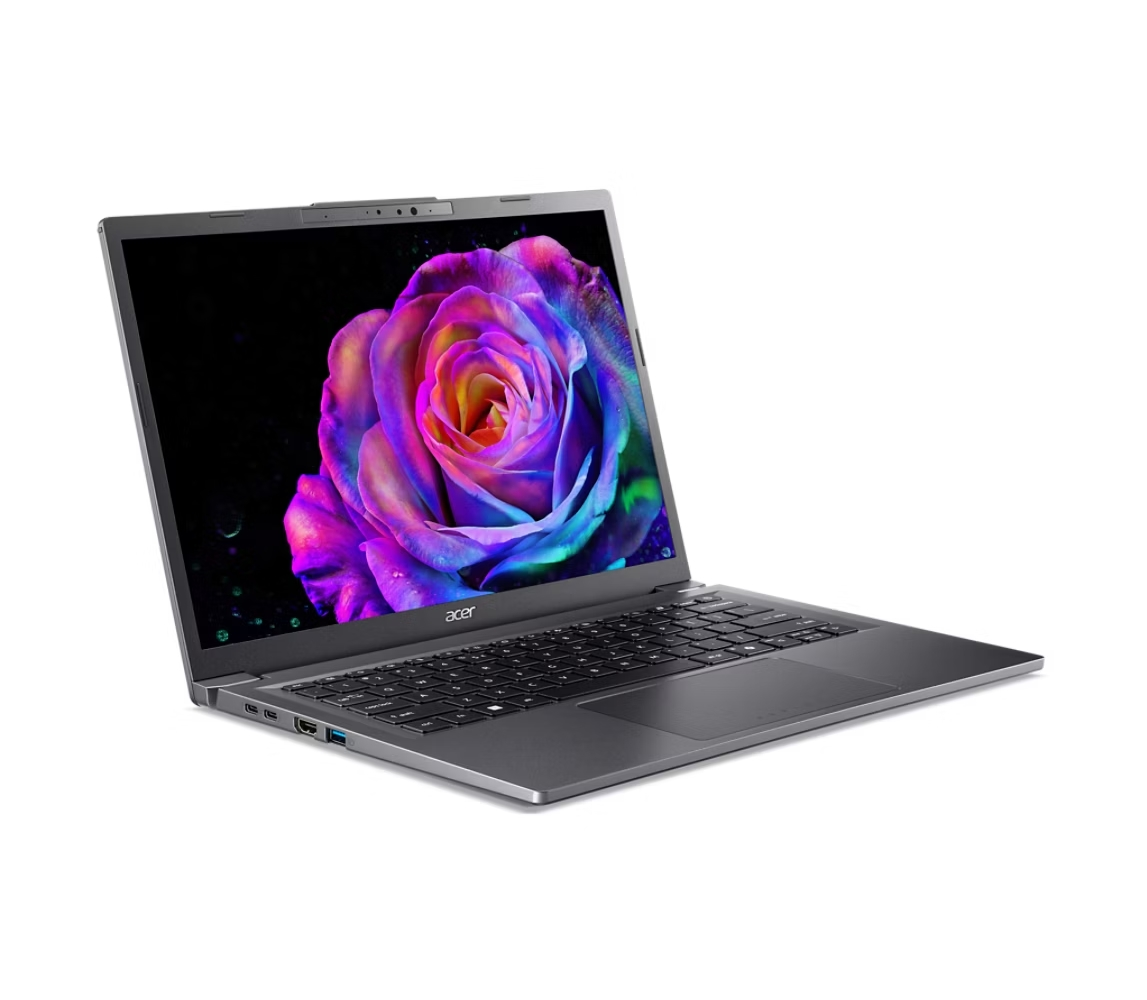 Laptop Acer aperto, fiore colorato sullo schermo, sfondo nero.