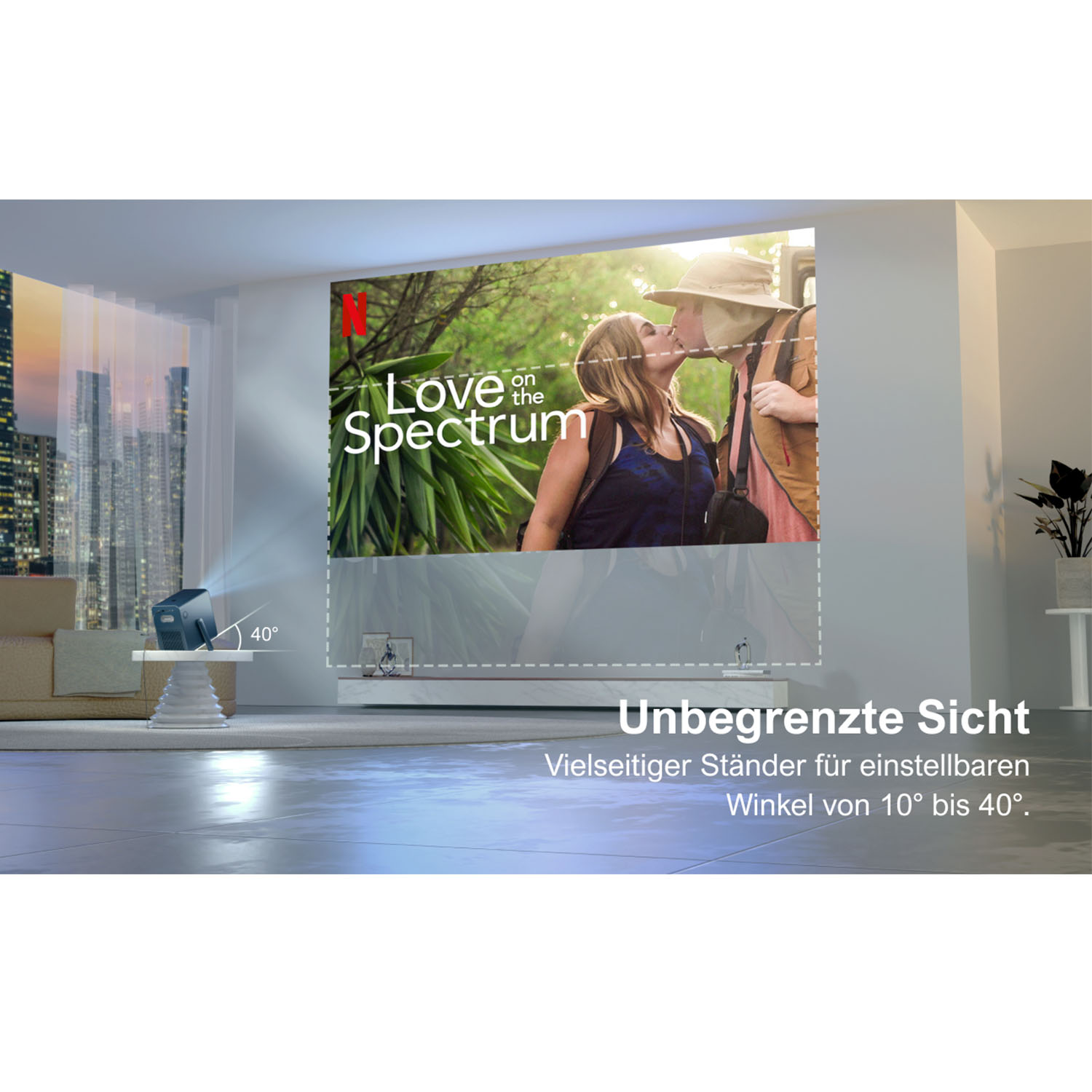 Projektor, der 'Love on the Spectrum' auf eine Wand projiziert. Ein Paar küsst sich auf dem Bildschirm. Text 'Unbegrenzte Sicht'.