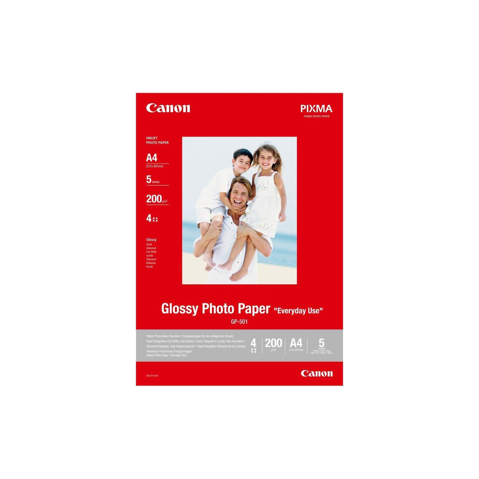 Eine rot-weiße Packung Canon Fotopapier. Das Bild auf der Vorderseite zeigt eine Familie. Das Papier ist glänzend.