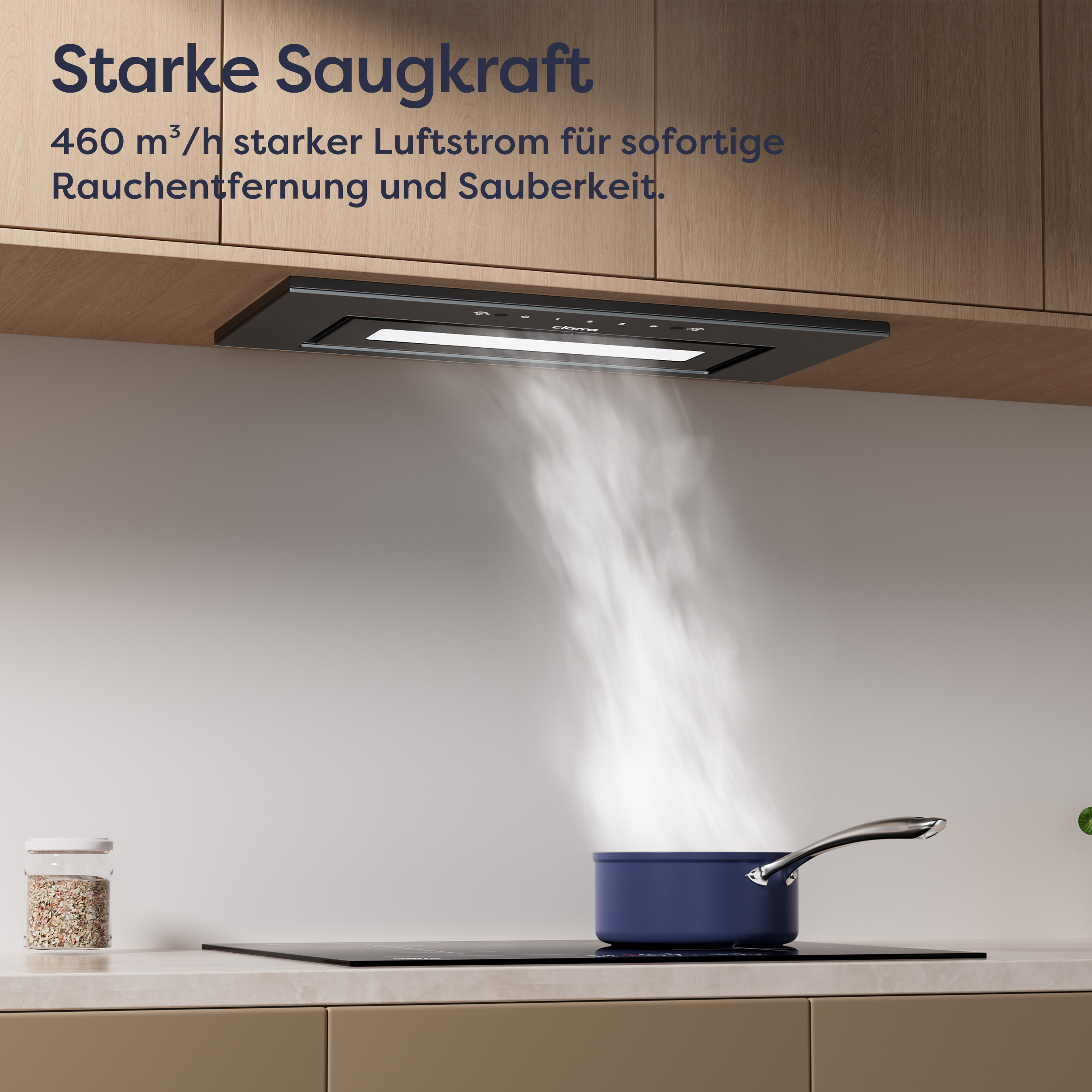 Küchenszene mit Dunstabzugshaube über einem blauen Topf. Dampf steigt auf. Text sichtbar.