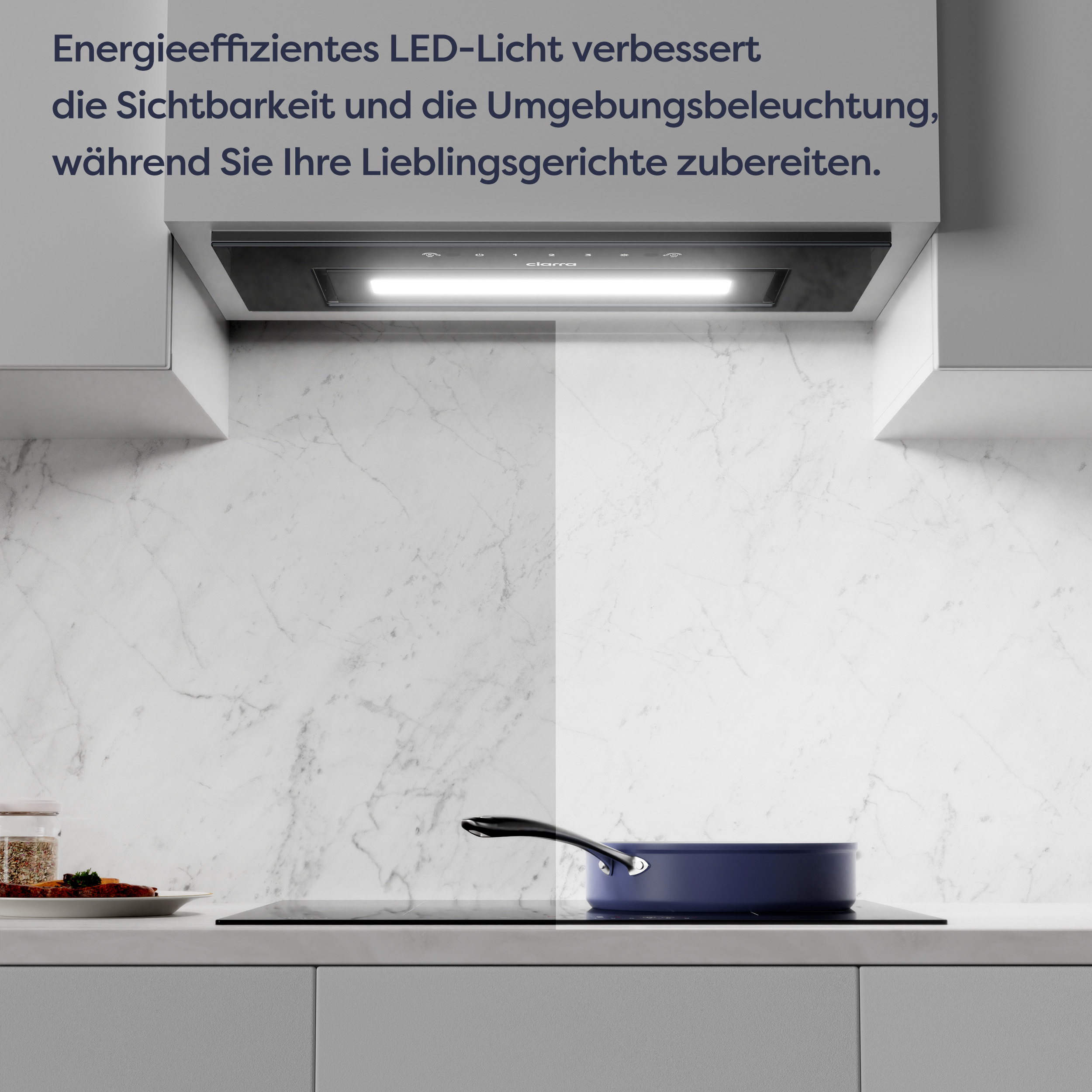 Dunstabzugshaube über einem Herd mit Topf, Küche beleuchtet, Text über LED-Licht.