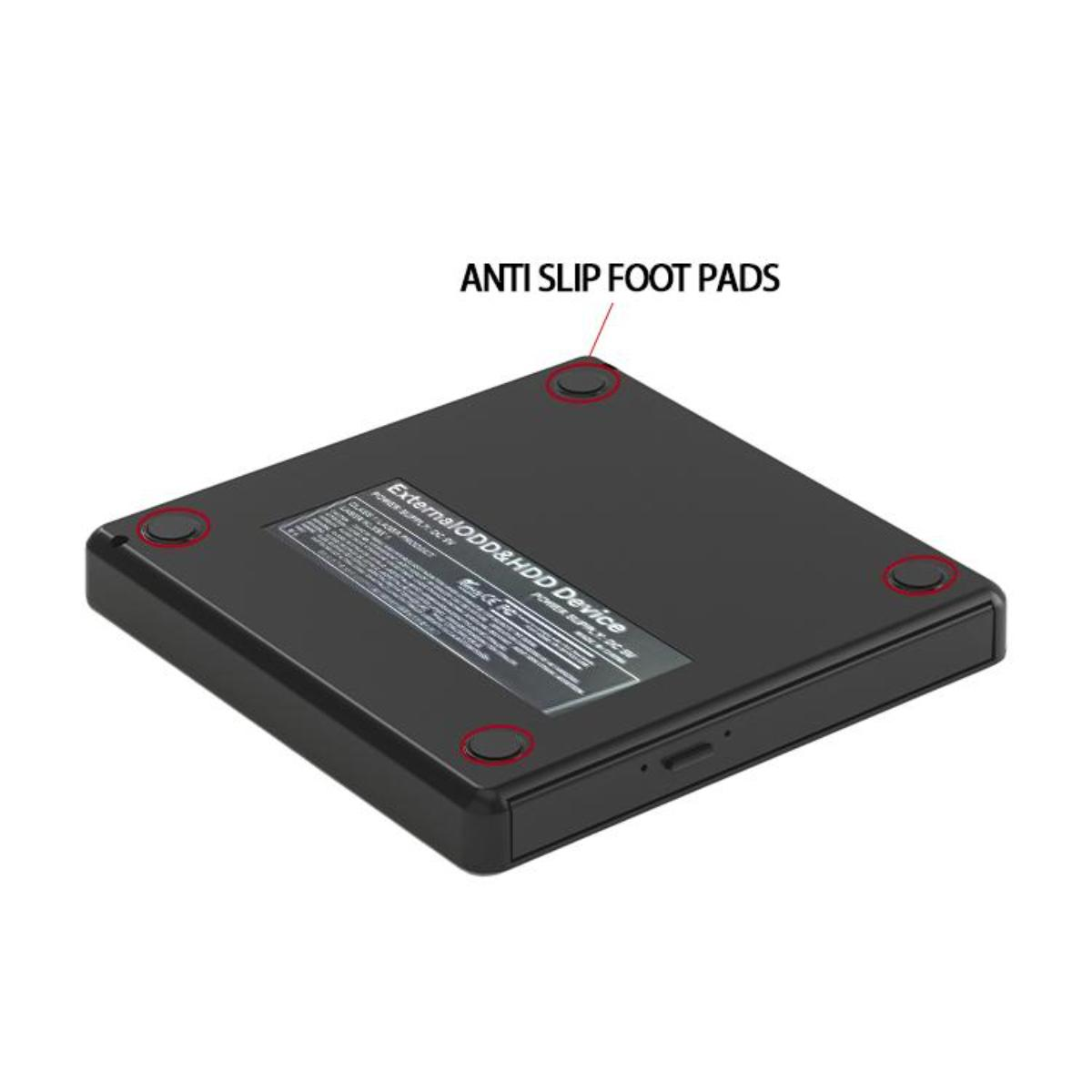 Ein schwarzes Gerät mit rutschfesten Fußpads. Das Gerät hat ein Etikett mit Text. Vier Pads sind sichtbar.