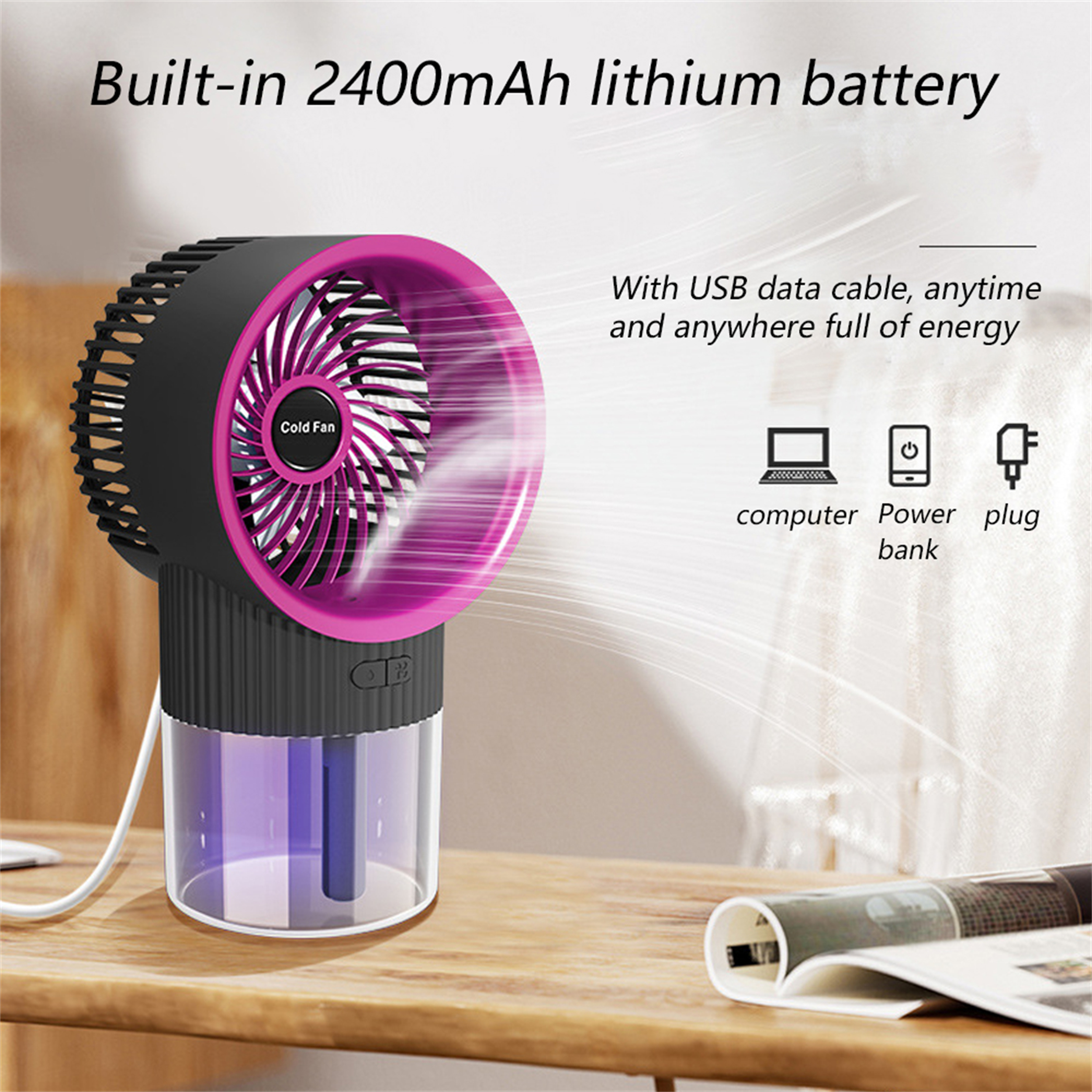 Kleiner Ventilator, pinke Details, schwarzer Körper, USB-Aufladung, in der Nähe eines Magazins.