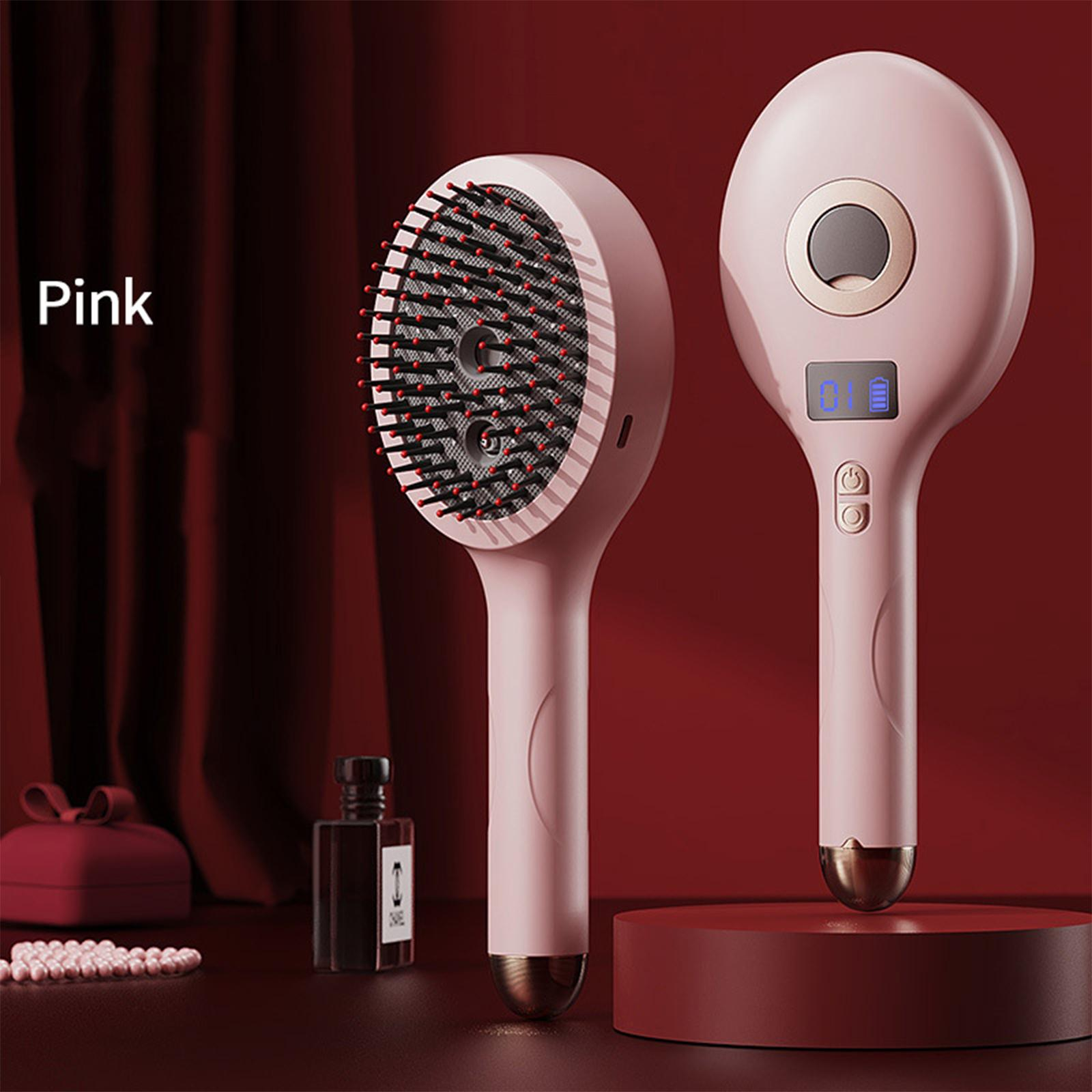 Zwei pinke Haarstylingbürsten mit roten Borstenspitzen auf rotem Hintergrund. Eine hat einen Bildschirm.
