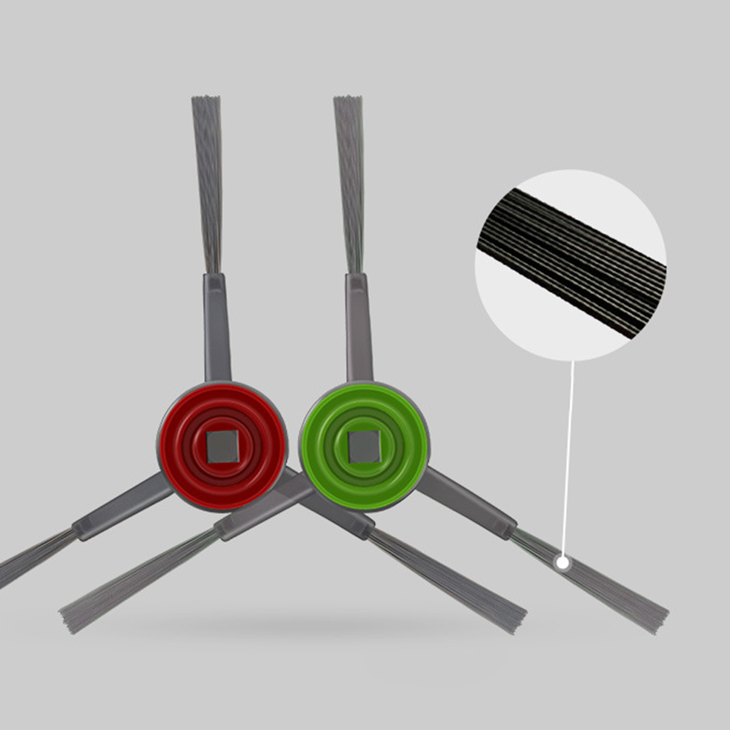 Twee robotstofzuigerborstels. Eén is rood, de andere groen. Close-up van borstelharen.