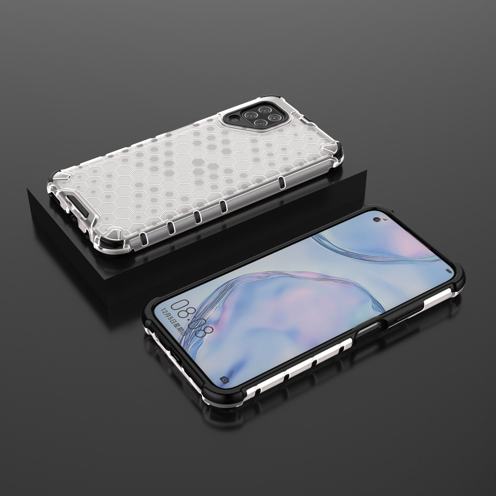 Dos teléfonos, uno con funda blanca de panal, el otro con marco negro.