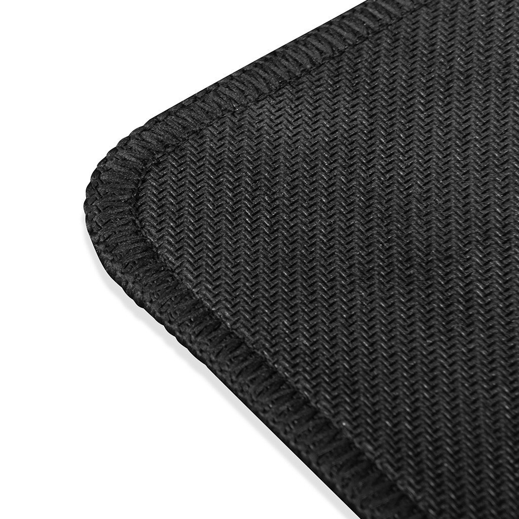 Zbliżenie czarnej, teksturowanej powierzchni z szytymi krawędziami.