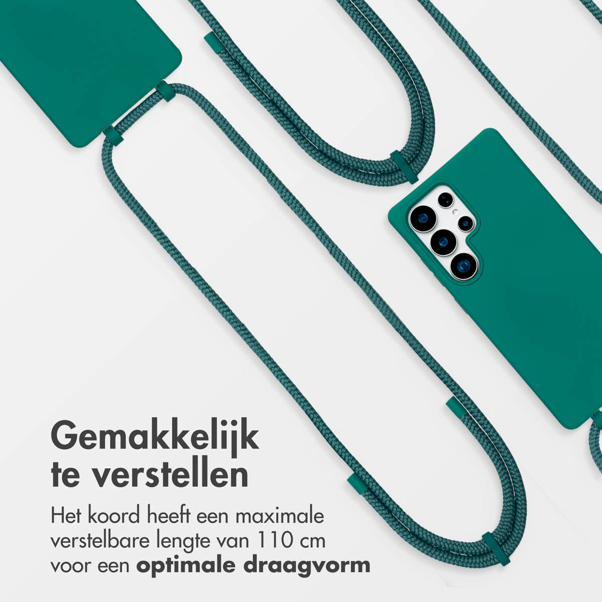 Groene telefoonhoes met koord en tekst in het Nederlands.