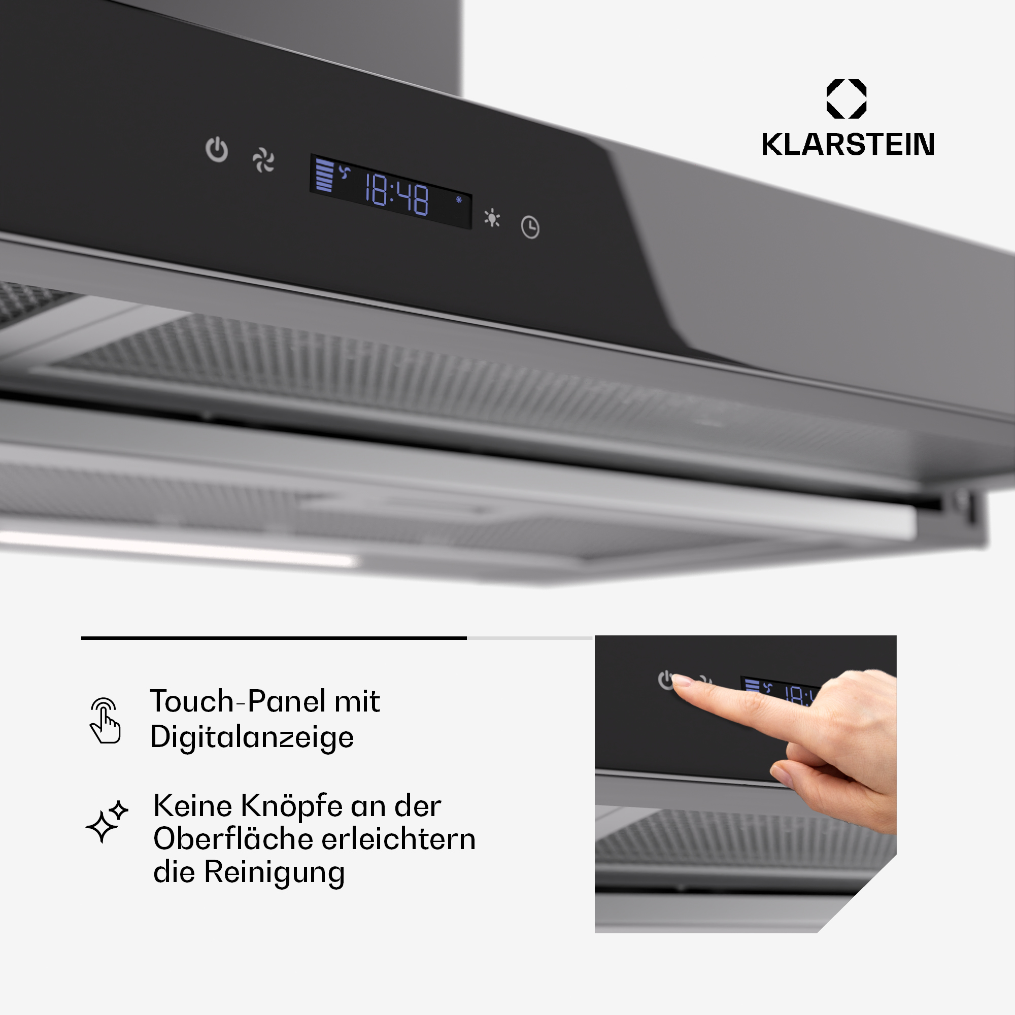 Nahaufnahme einer schwarzen Küchenhaube. Touch-Panel mit Digitalanzeige, Hand berührt Taste.