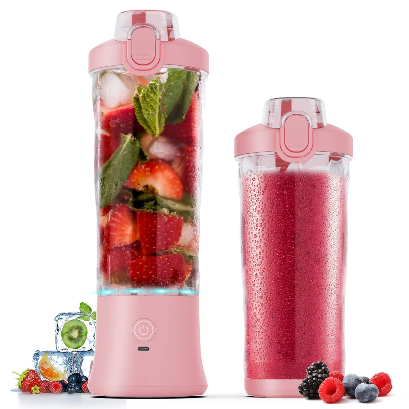 Rosa Mixer mit Zutaten und einem Smoothie, mit Eiswürfeln und Beeren.