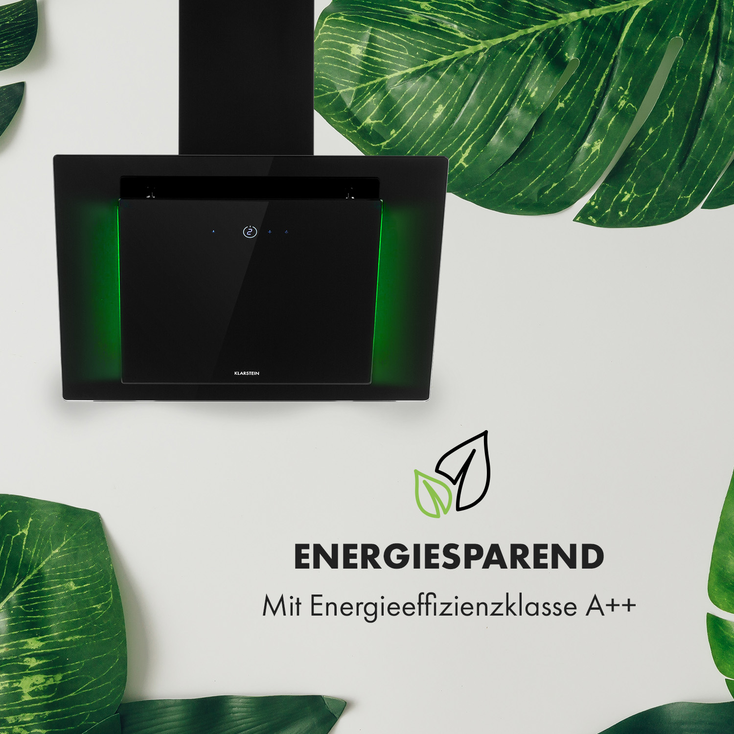 Cappa nera con luci verdi. Foglie ai lati e testo sull'efficienza energetica.