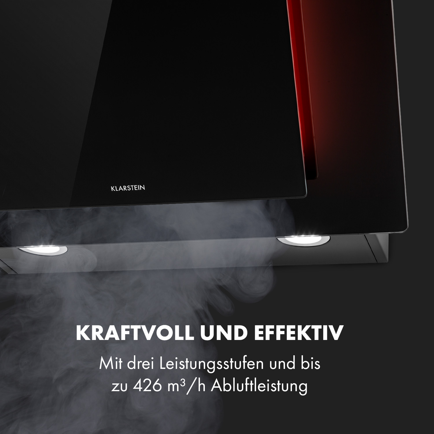 Cappa nera con fumo e luci. Testo: "Kraftvoll und Effektiv" e uscita dell'aria.