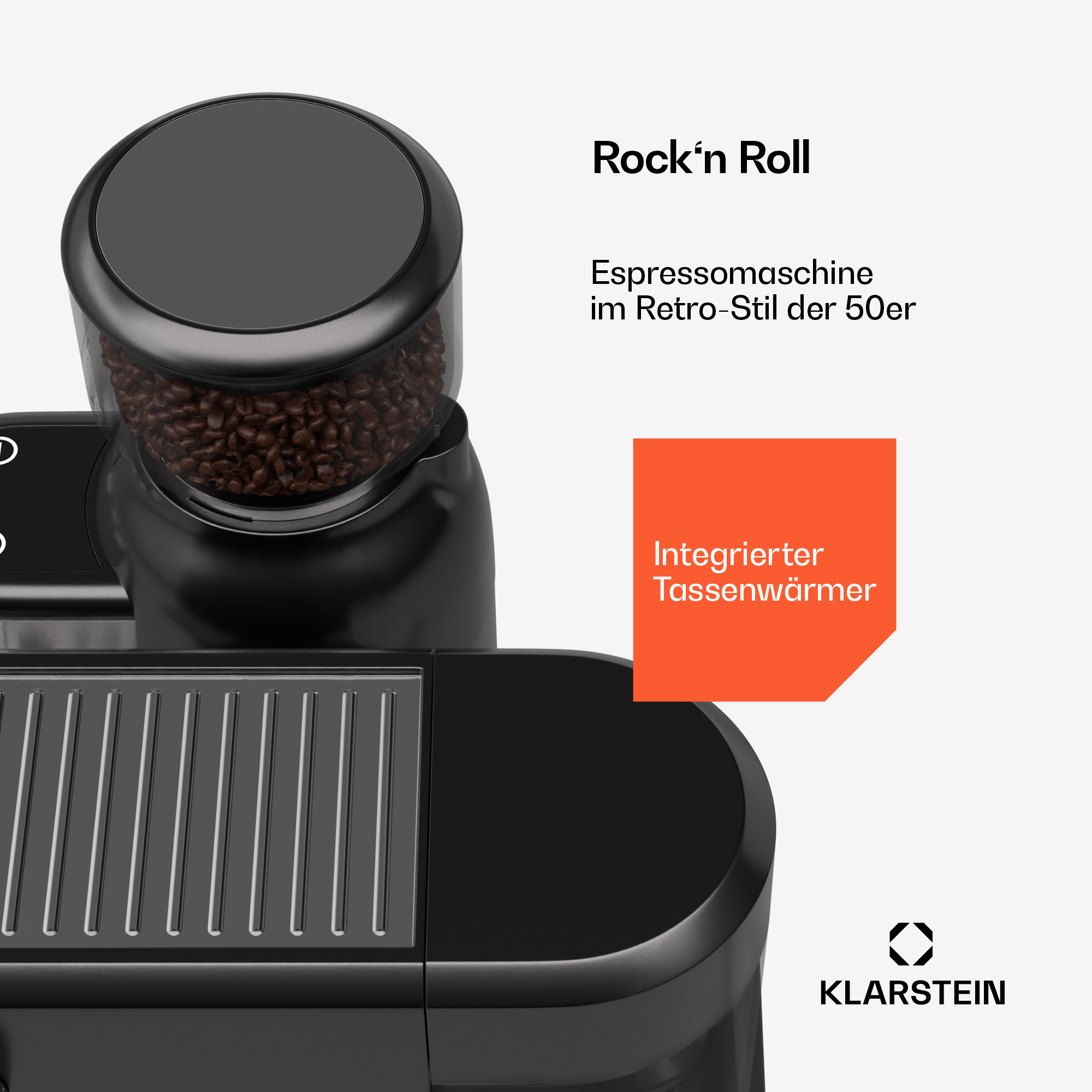 Máquina de espresso negra, granos en recipiente transparente y acento naranja.