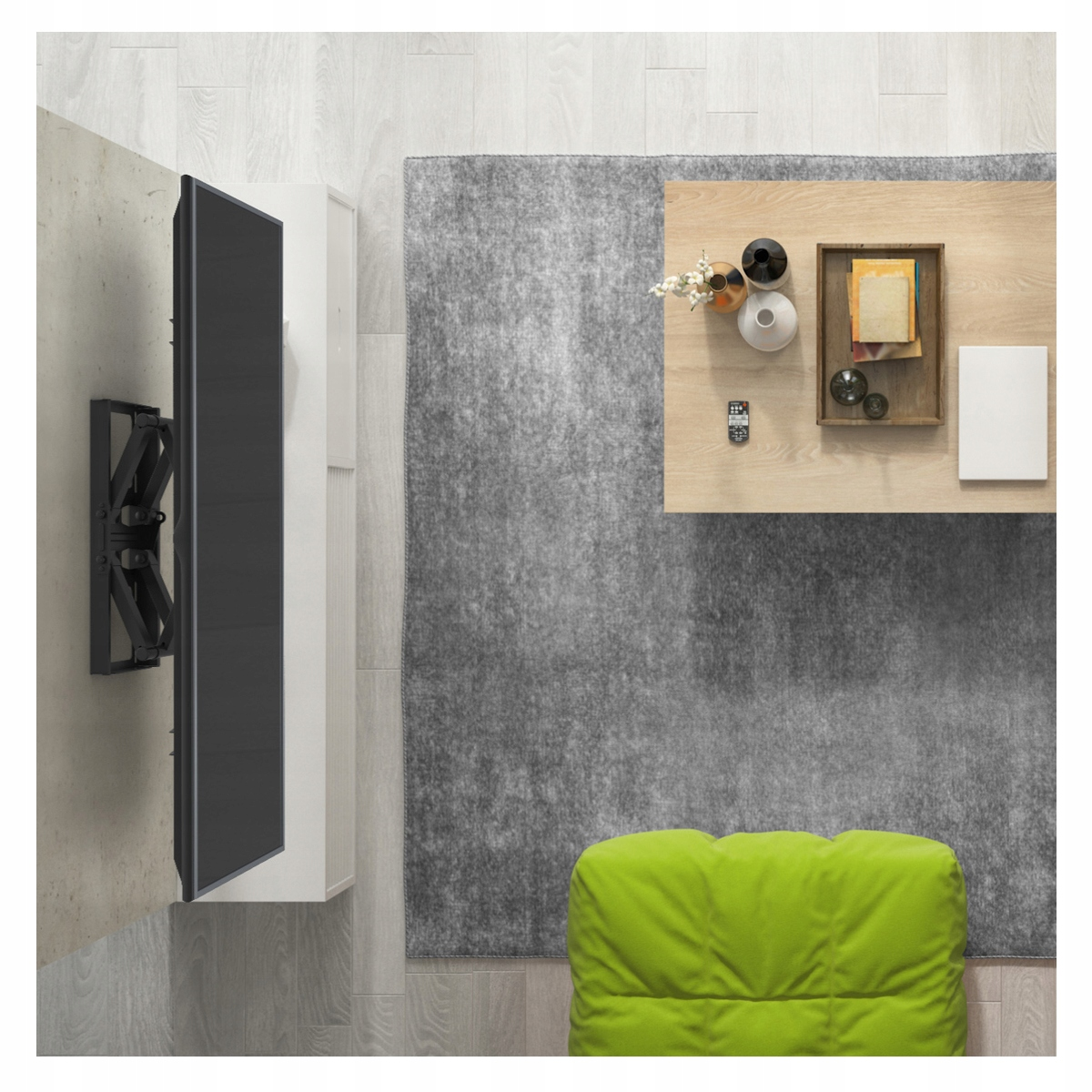 Widok z góry na salon z telewizorem zamontowanym na ścianie. Widoczne są sofa i stolik kawowy.