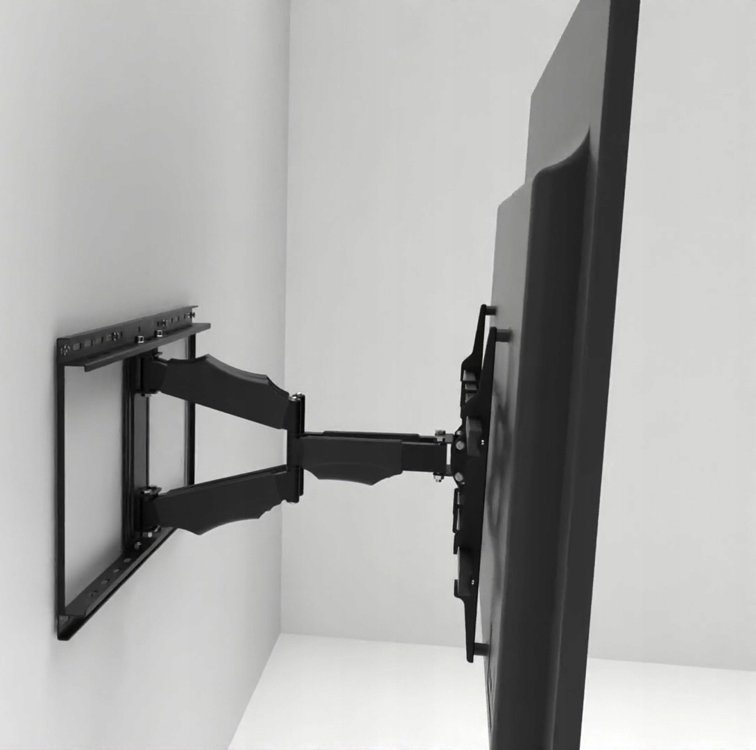 Telewizor zamontowany na czarnym uchwycie ściennym wystającym z białej ściany narożnej, pokazujący regulację.